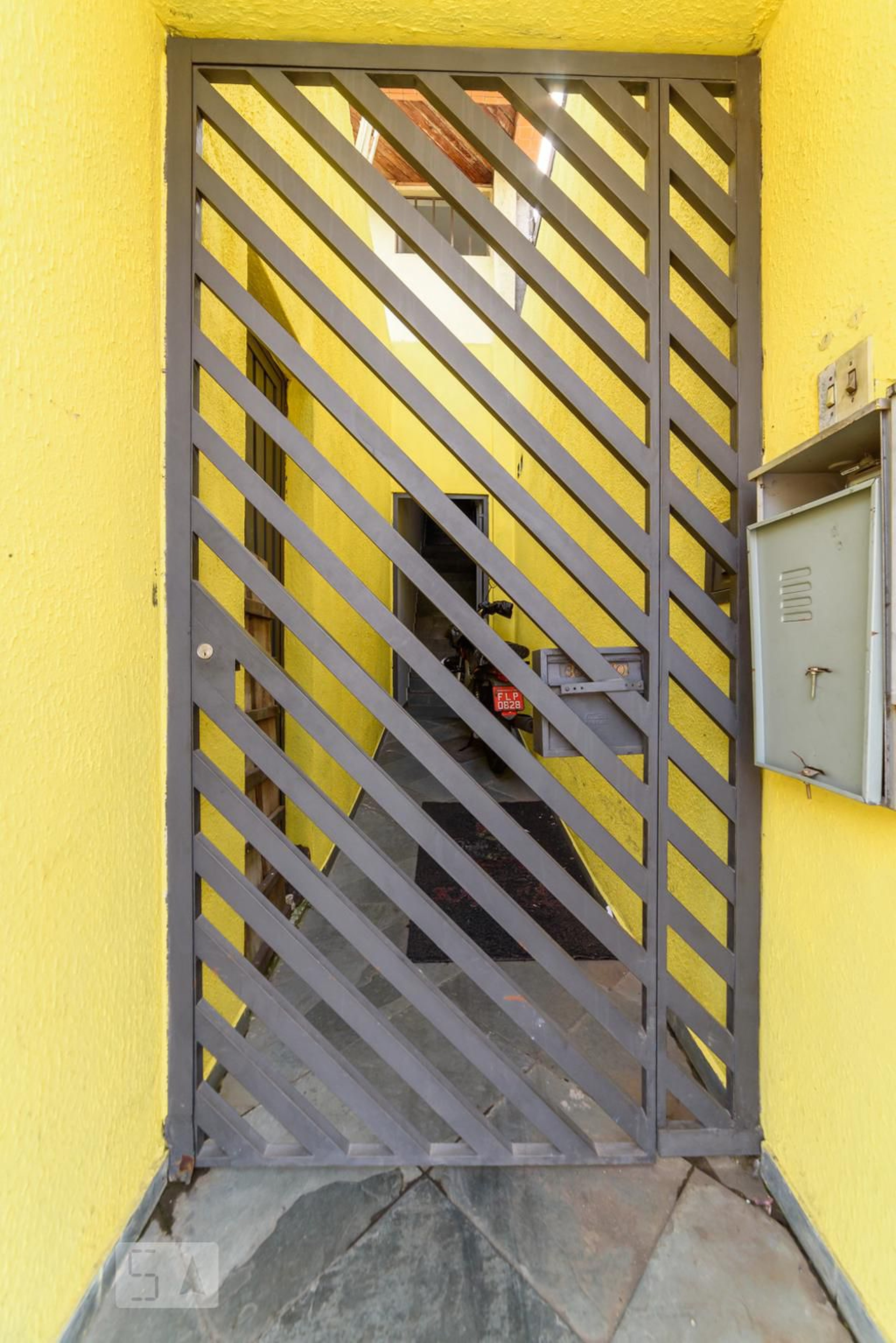 Fachada Condomínio em Rua Tibiriçá, 636