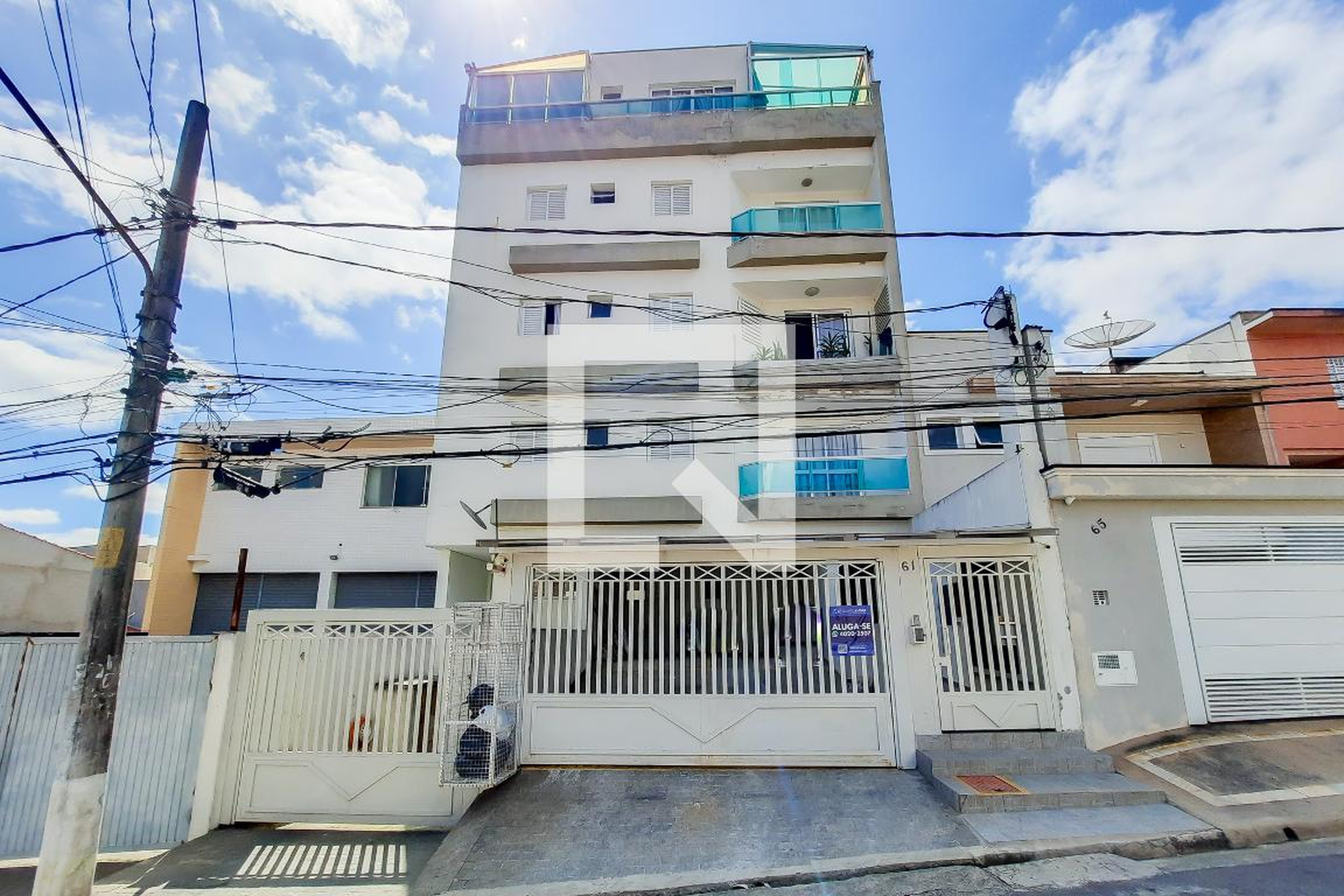 Fachada Condomínio em Rua Washington Luis, 61b