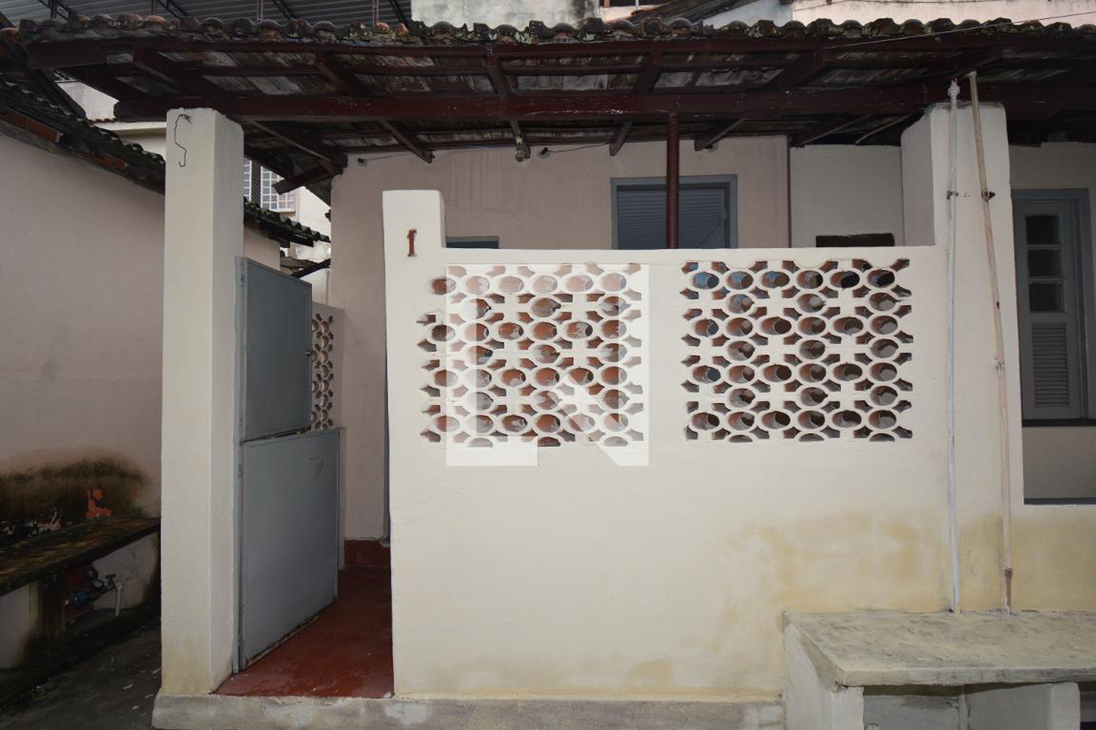 Fachada Condomínio em Rua Andrade Araújo, 830