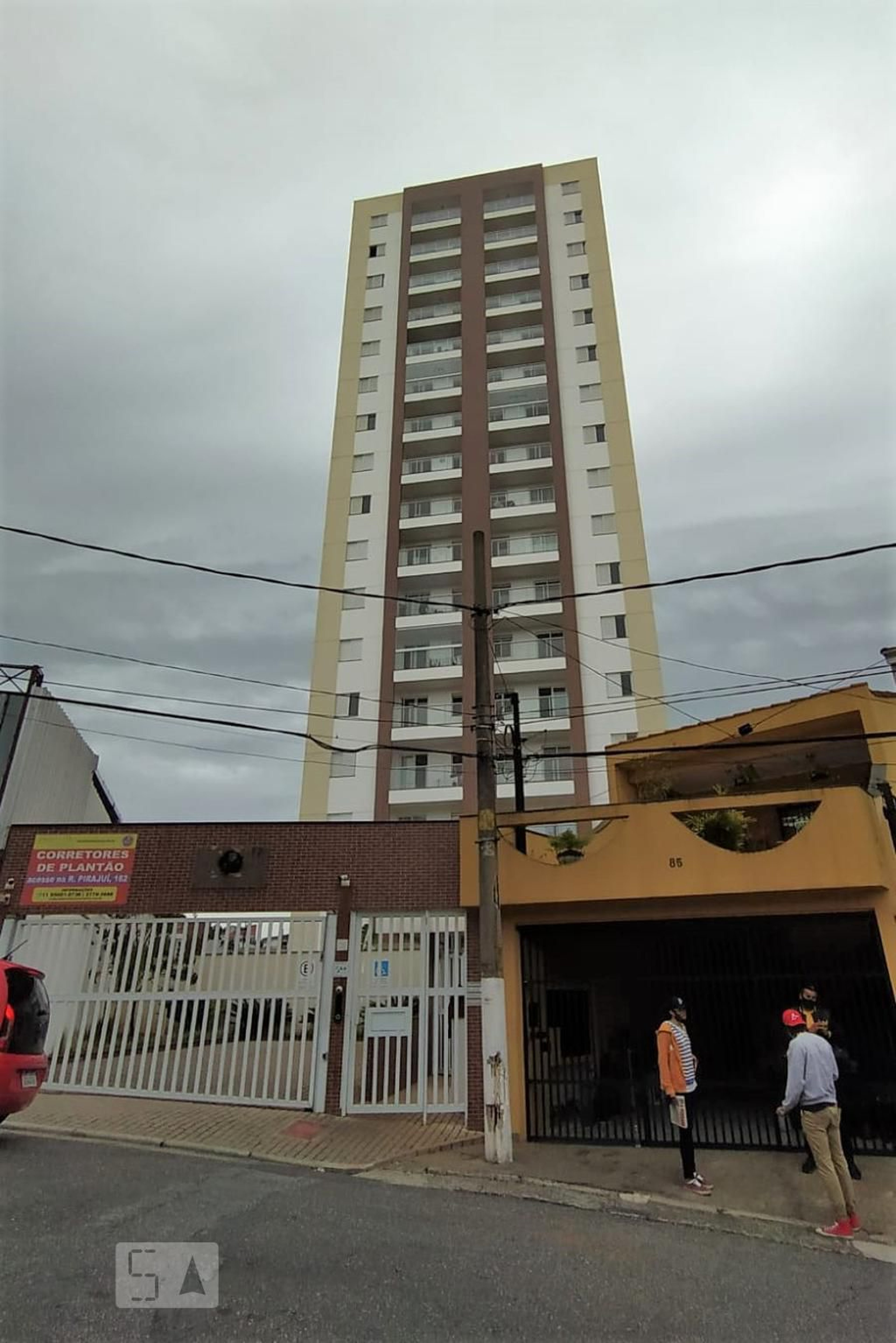 Fachada do Condomínio Condomínio Top Village