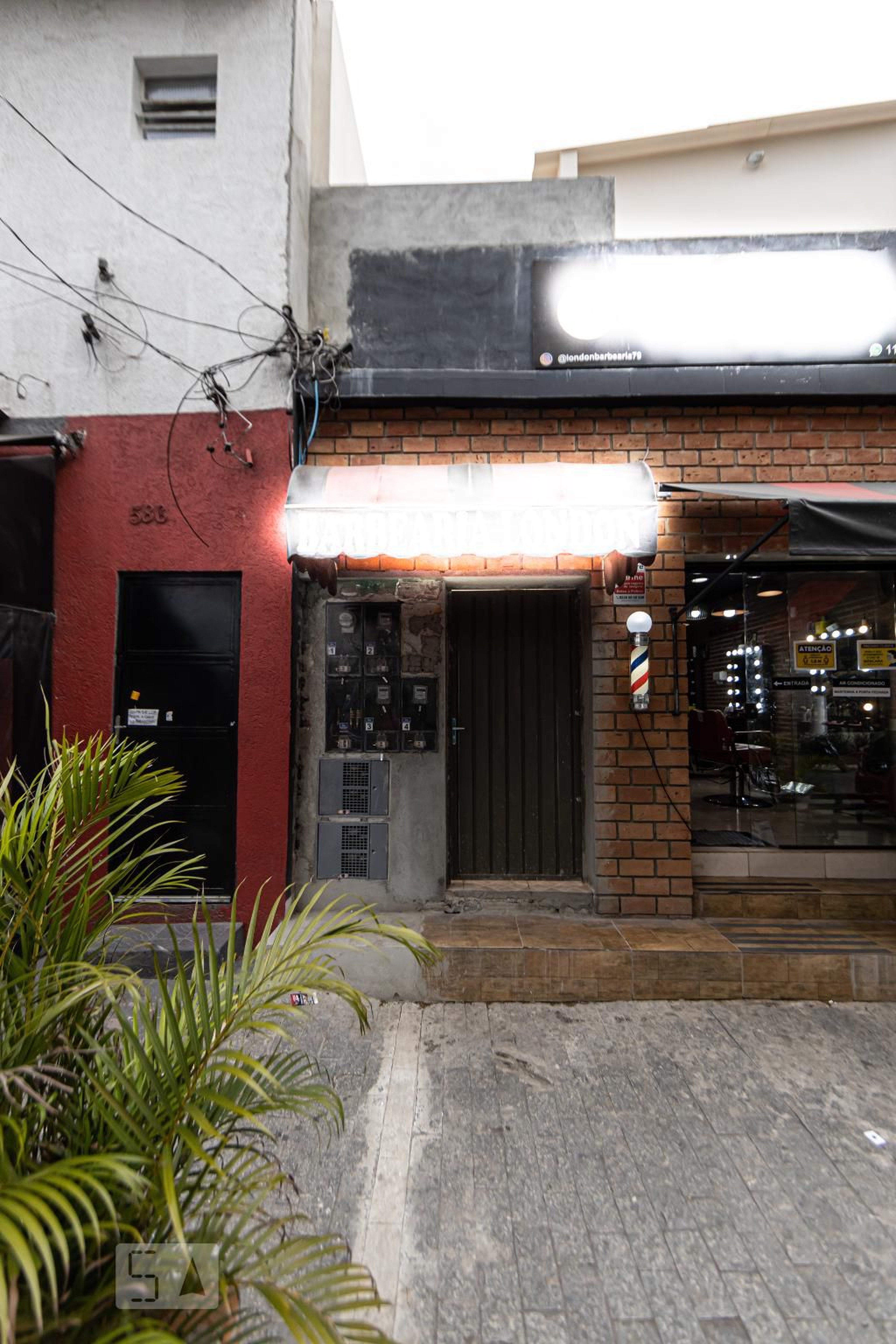 Fachada Condomínio em Rua Ulisses Cruz, 582