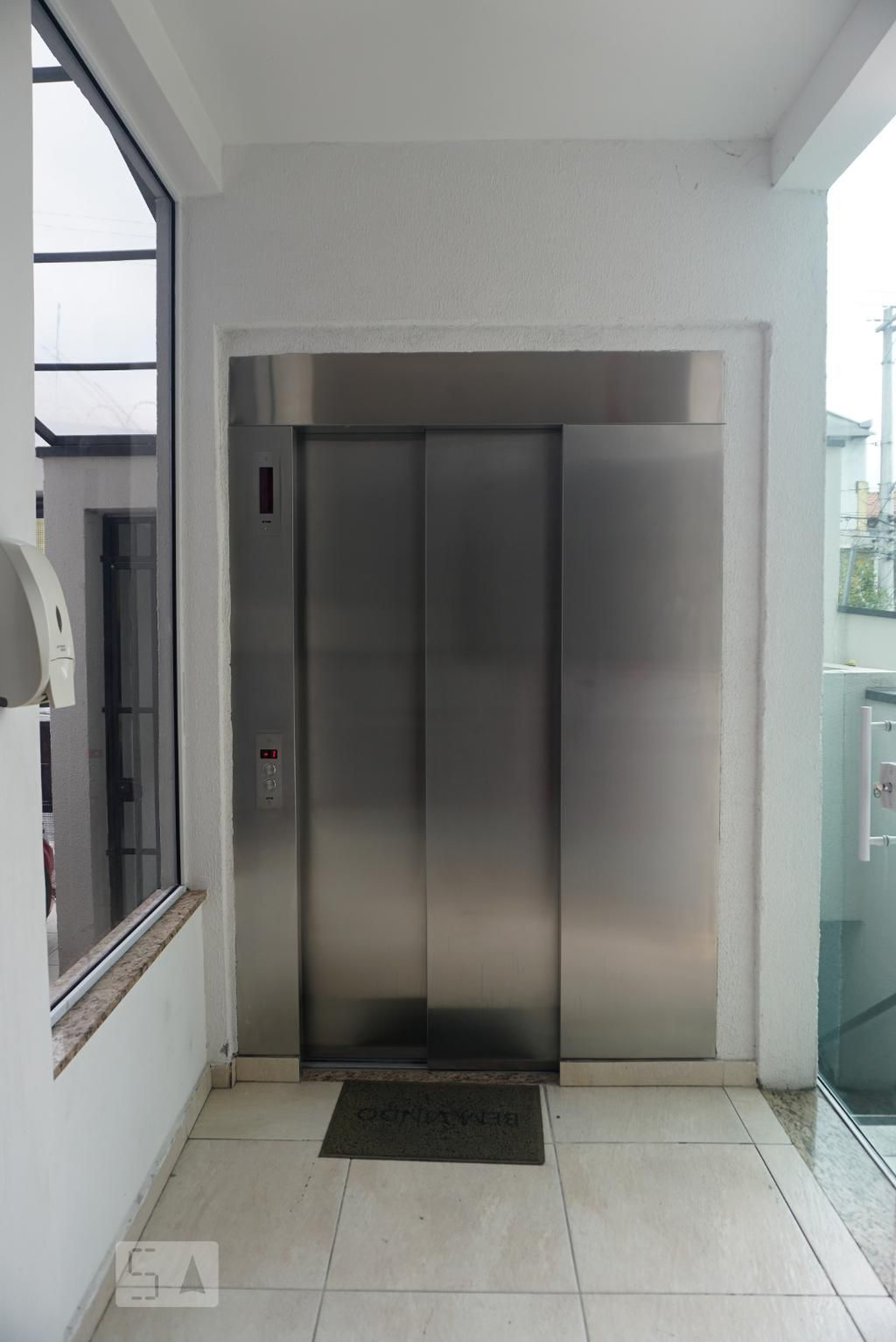 Elevador - Maria Luiza