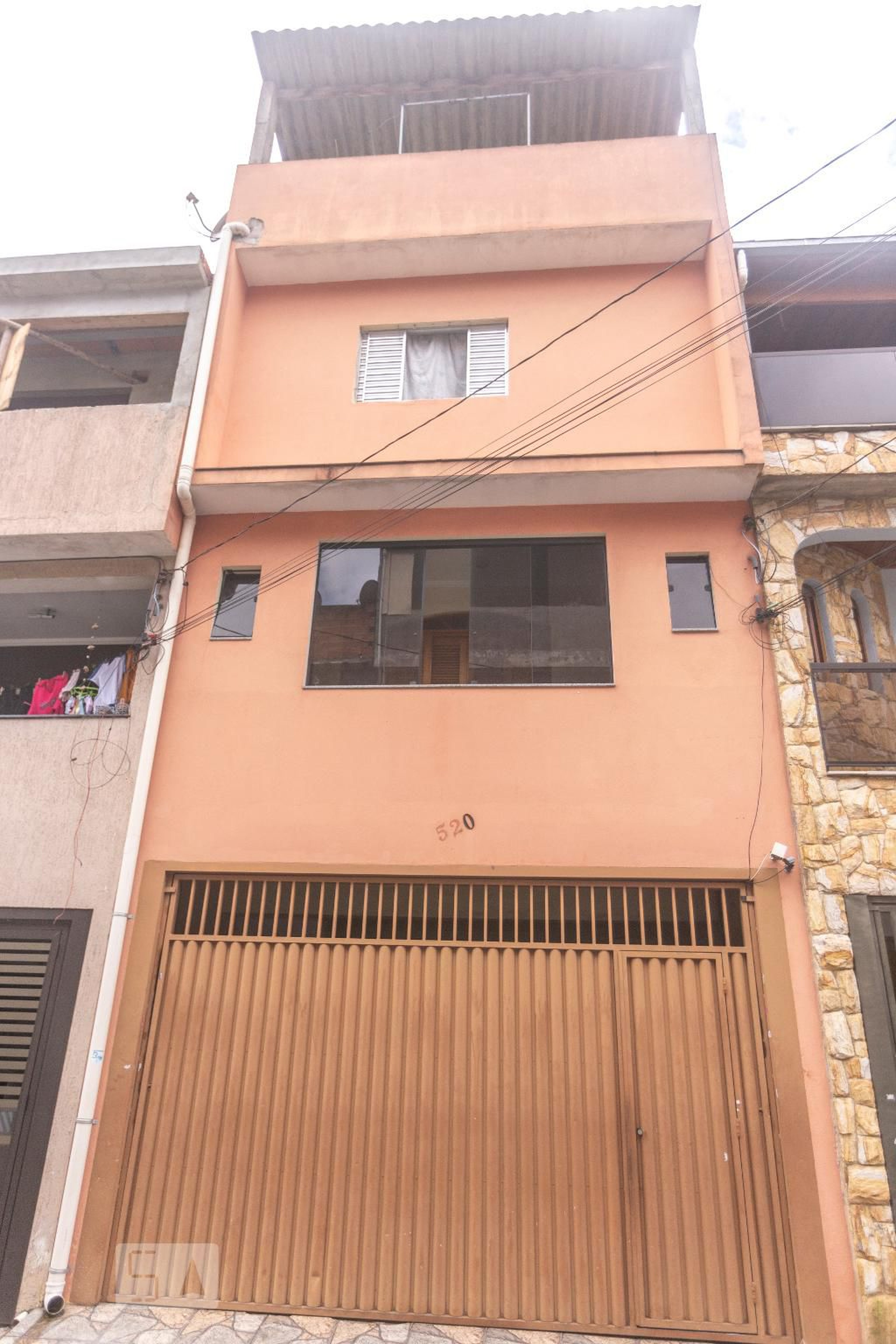 Fachada Condomínio em Rua Por do Sol, 520