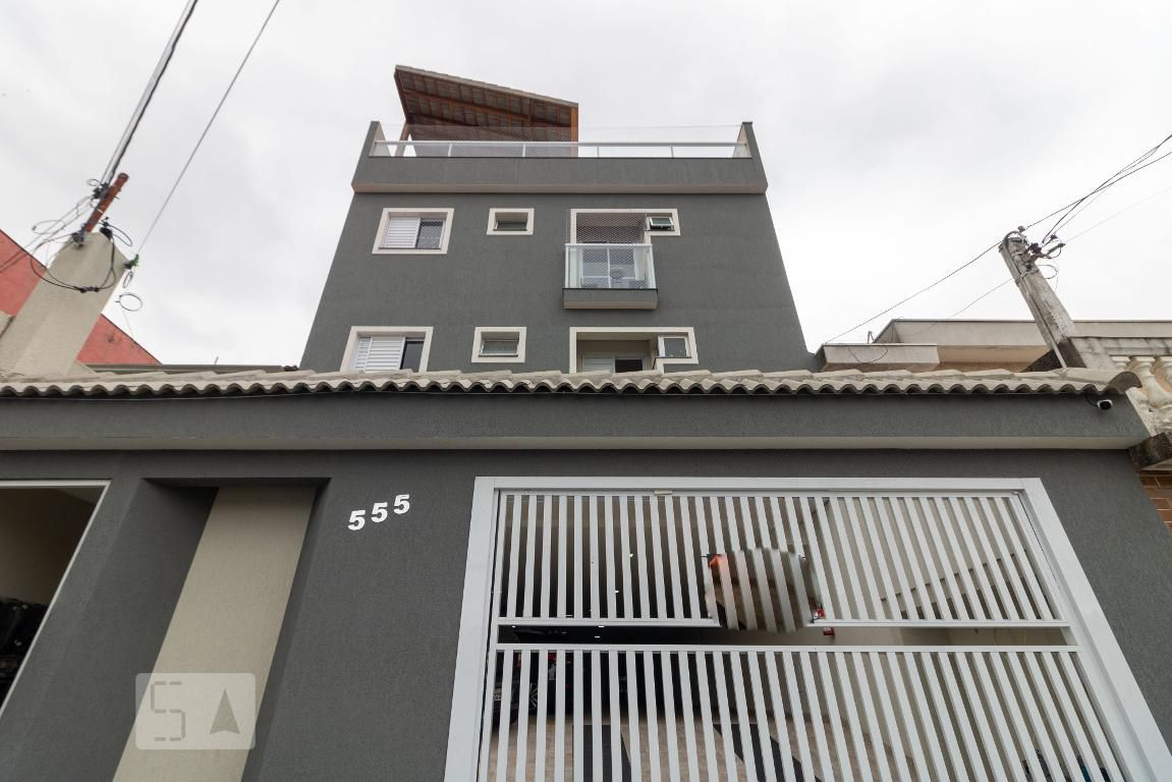 Fachada Condomínio em Rua Emílio de Menezes, 555