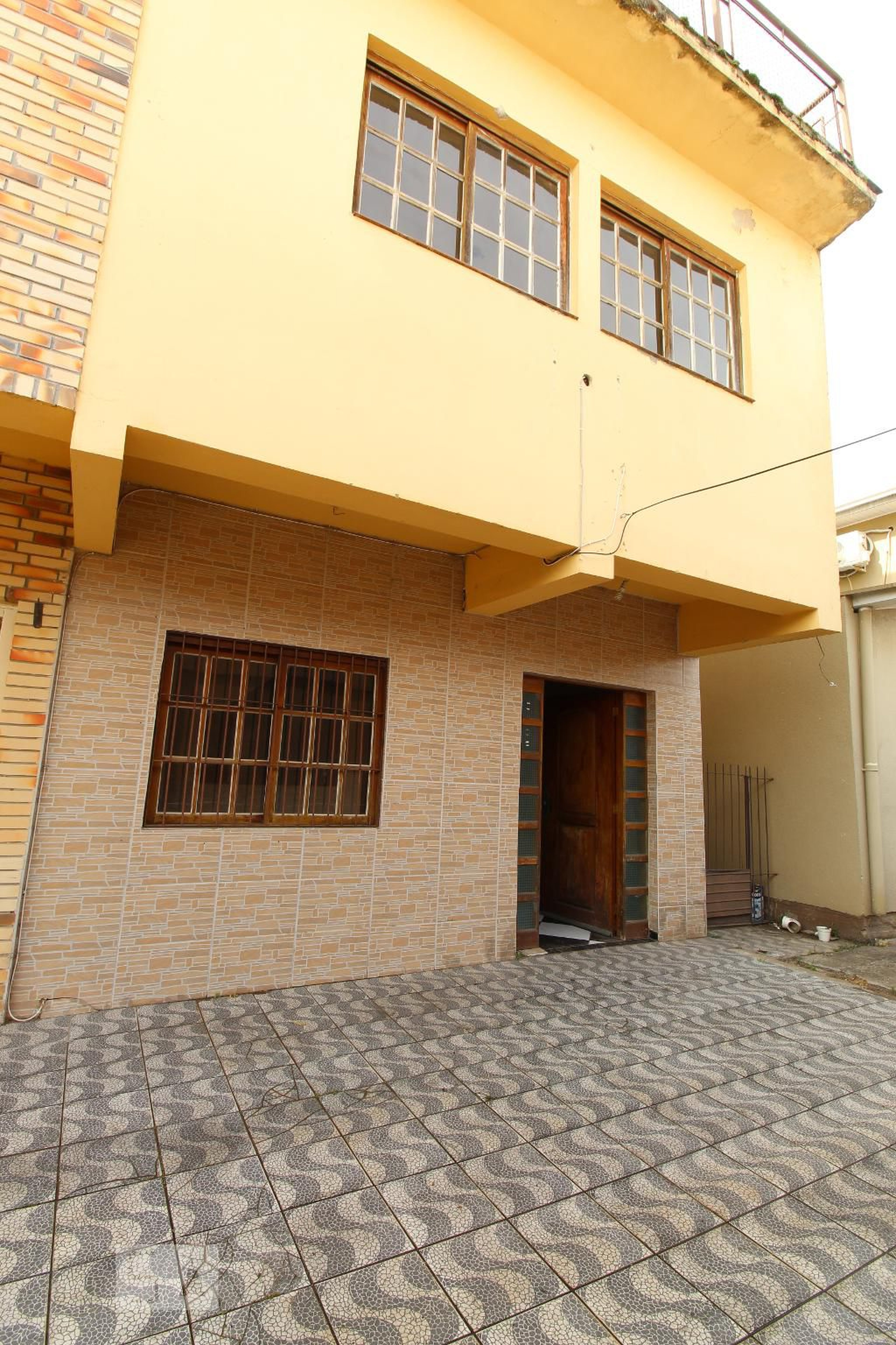 Fachada Condomínio em Rua Breno Baldo, 69