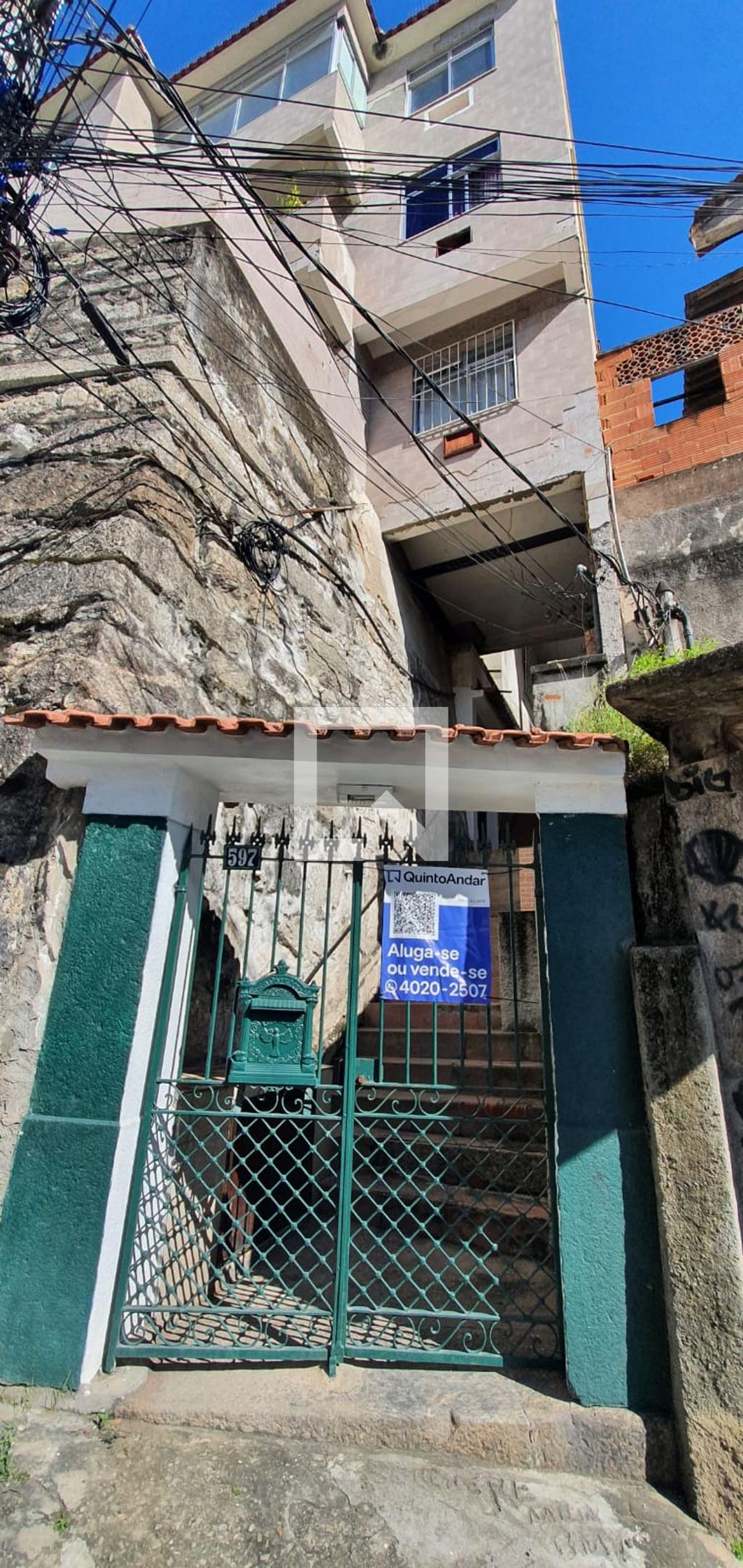 Fachada Condomínio em Rua Maia de Lacerda, 597