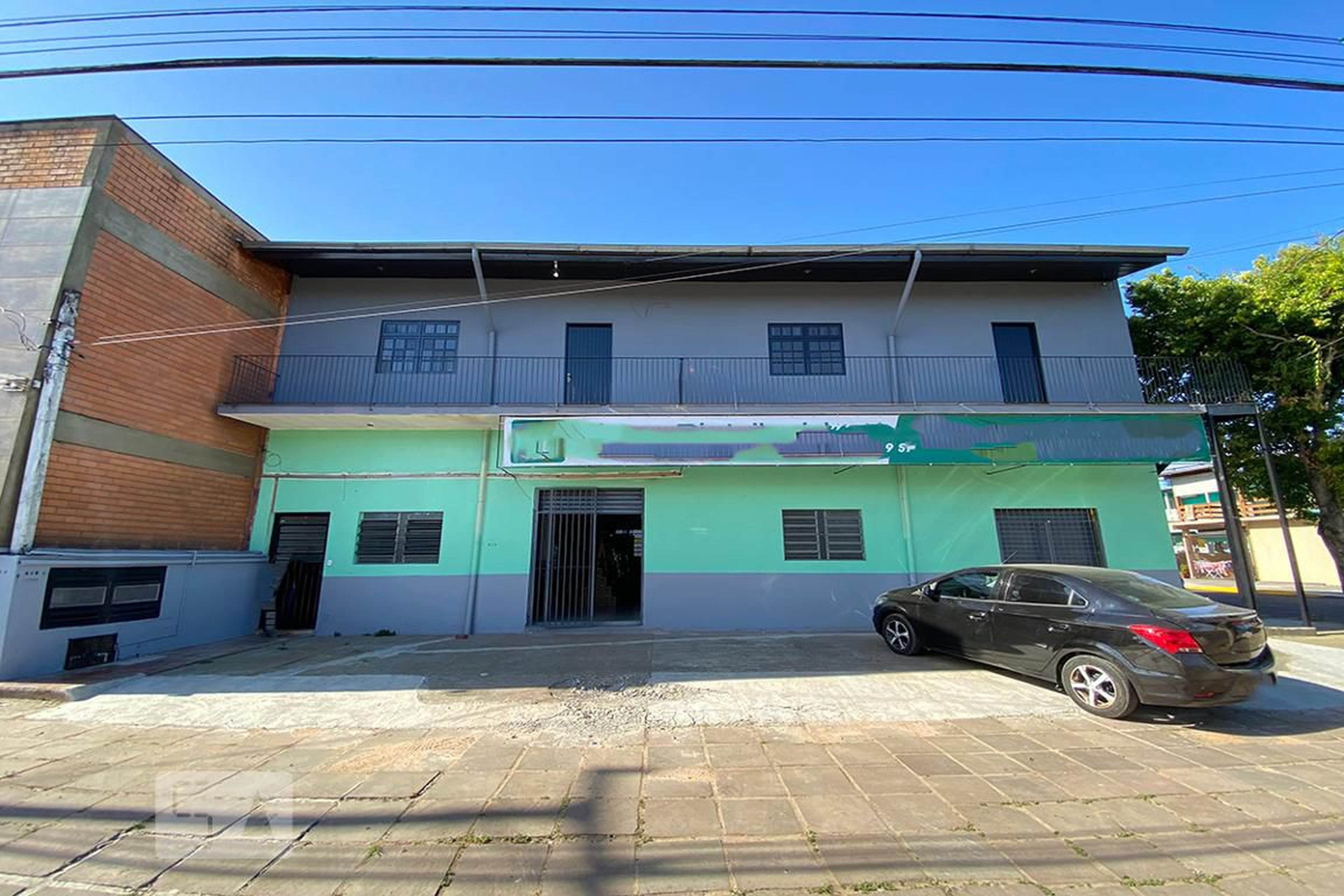 Fachada Condomínio em Rua Doutor Simões Lopes, 418