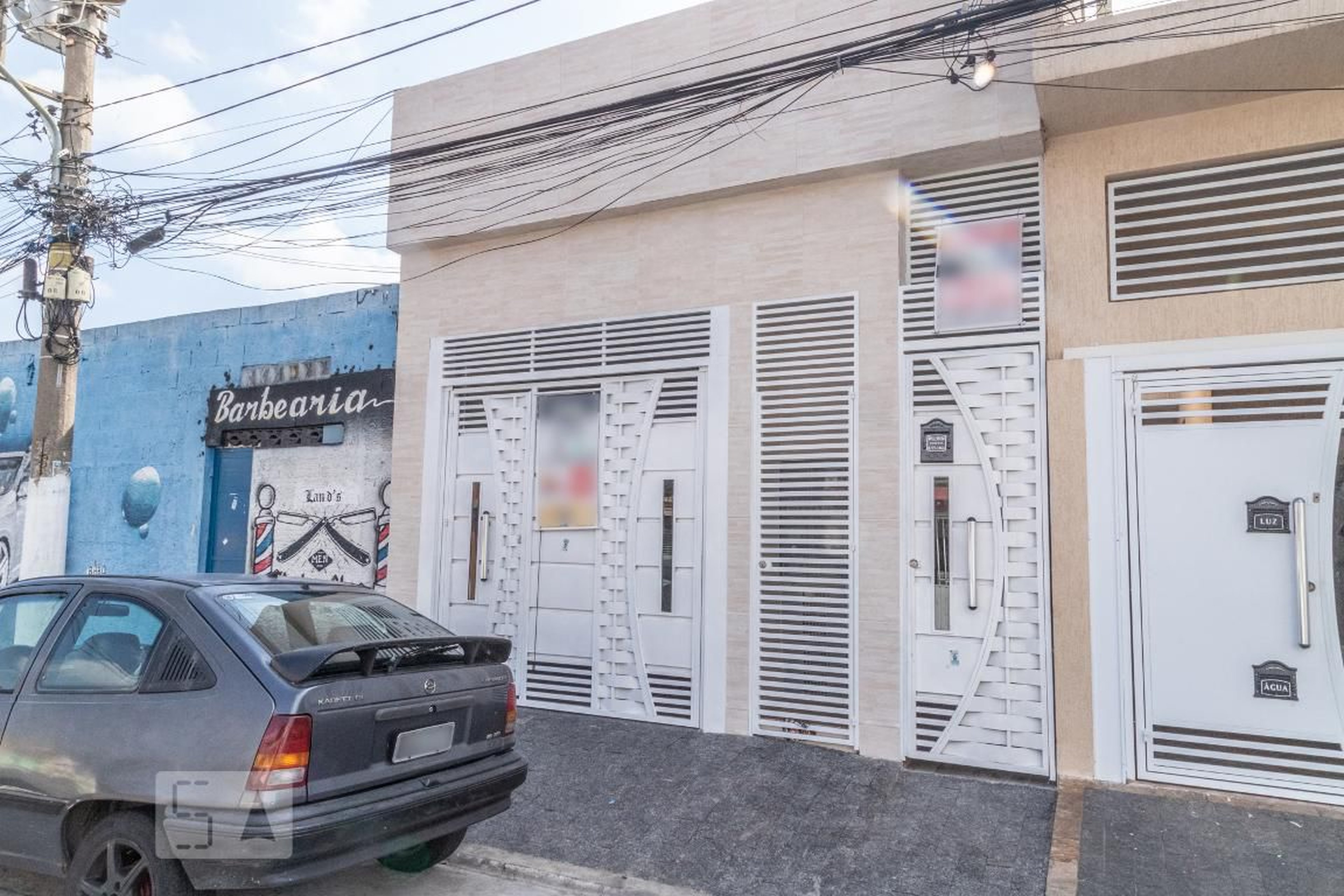 Fachada Condomínio em Rua Maestro Ernesto Lahos, 78