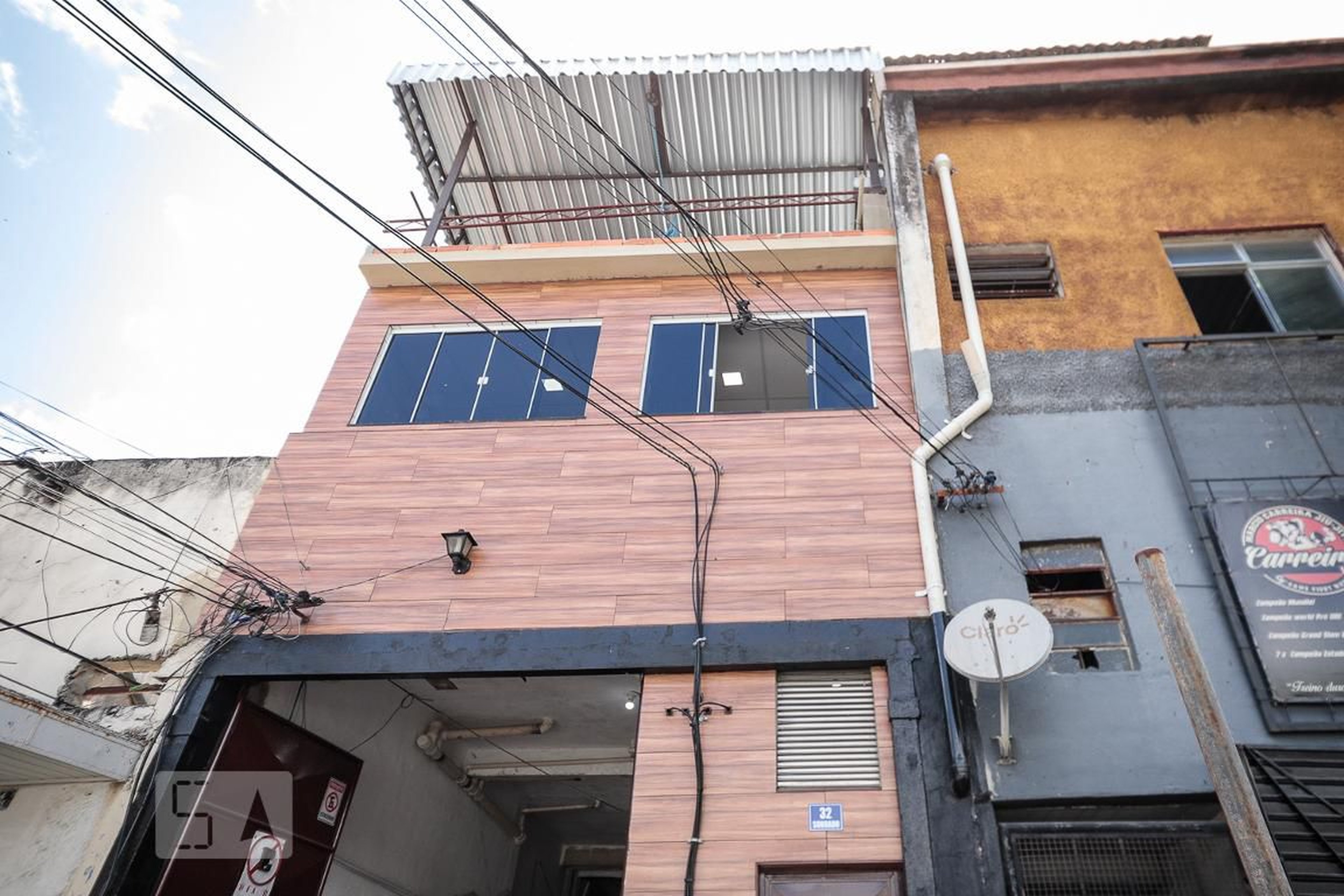 Fachada Condomínio em Rua Acaré, 32