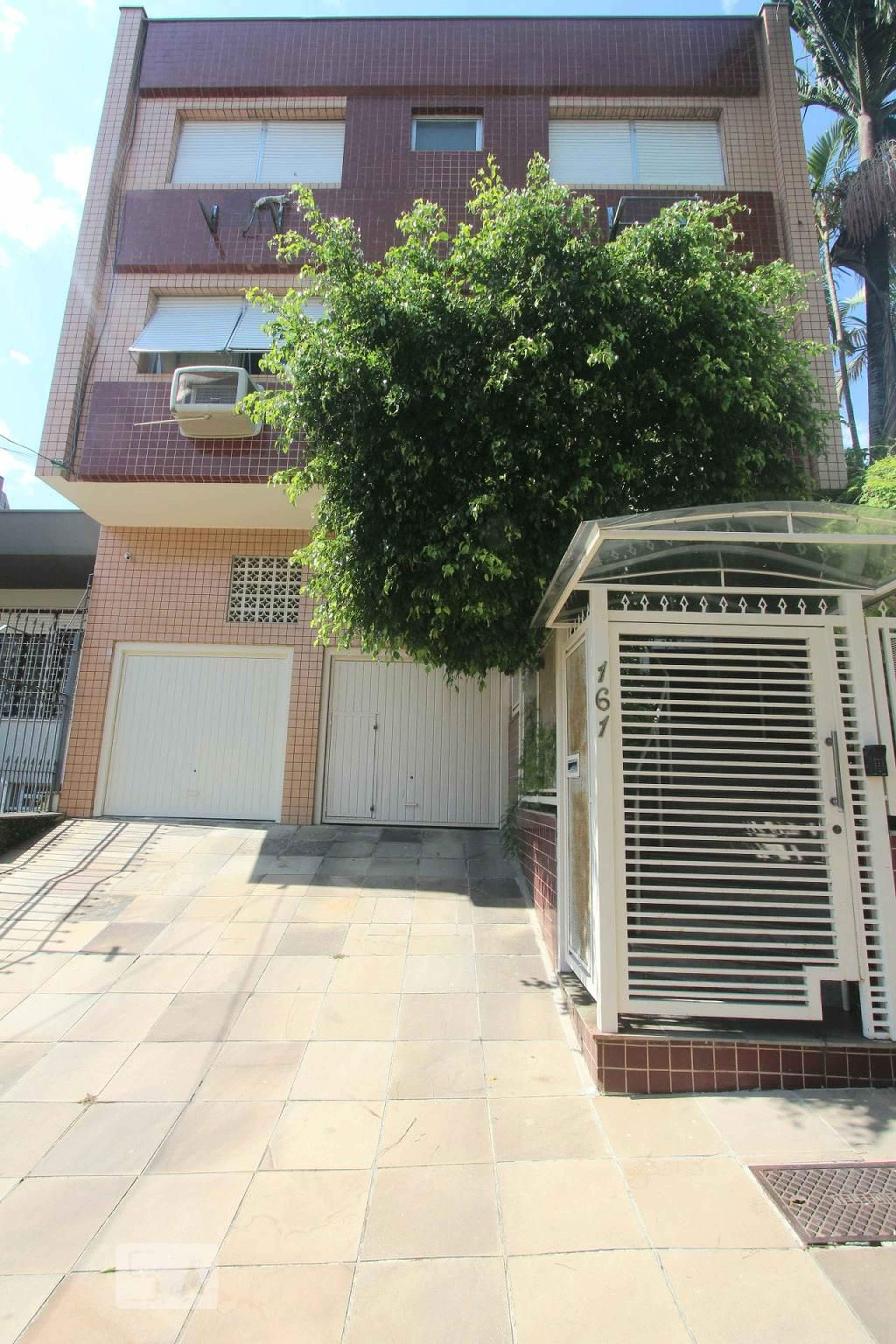 FACHADA Condomínio em Rua Coronel Manoel Py, 161