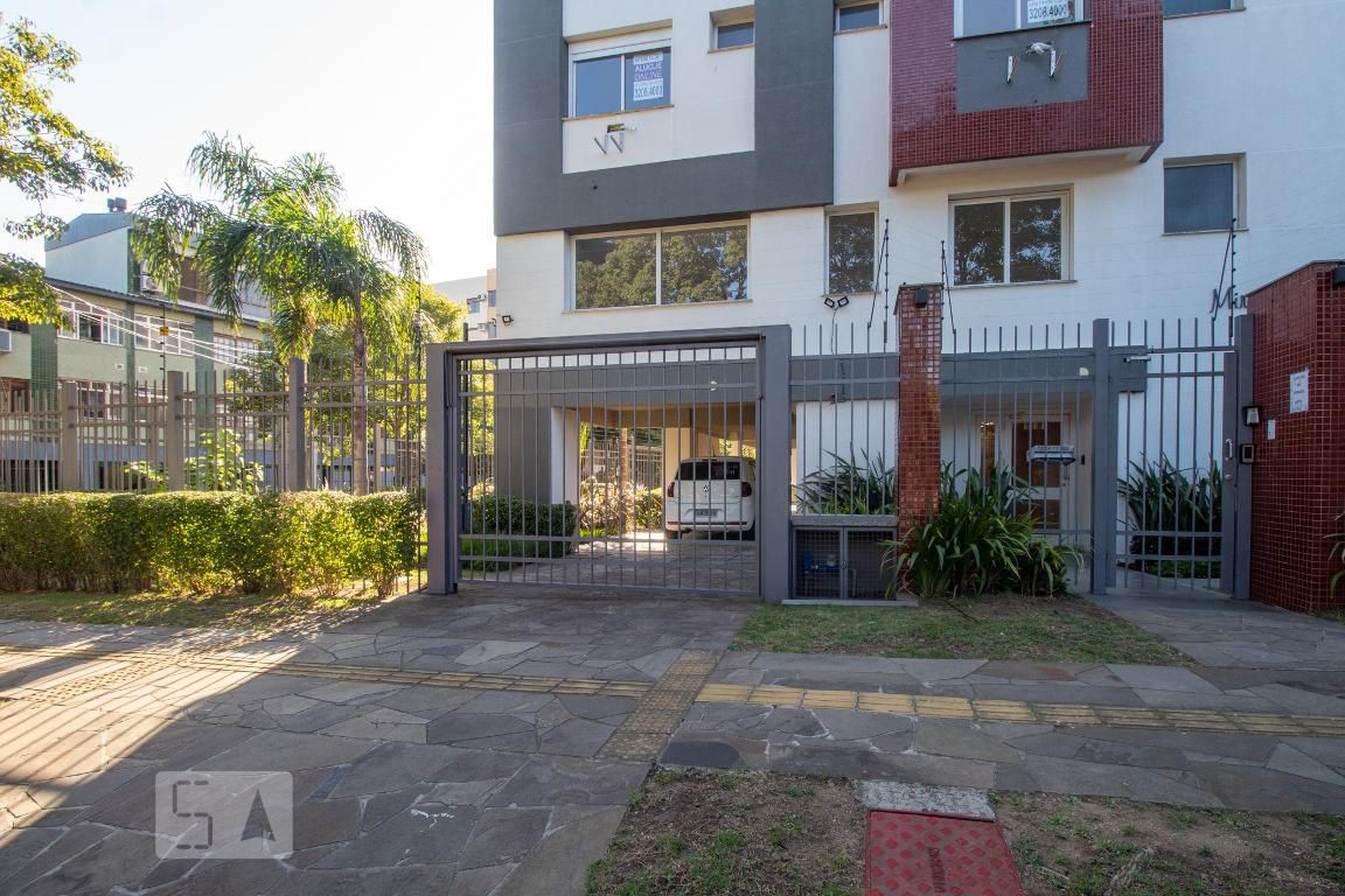 Fachada Condomínio em Rua Isidoro Tressi, 303