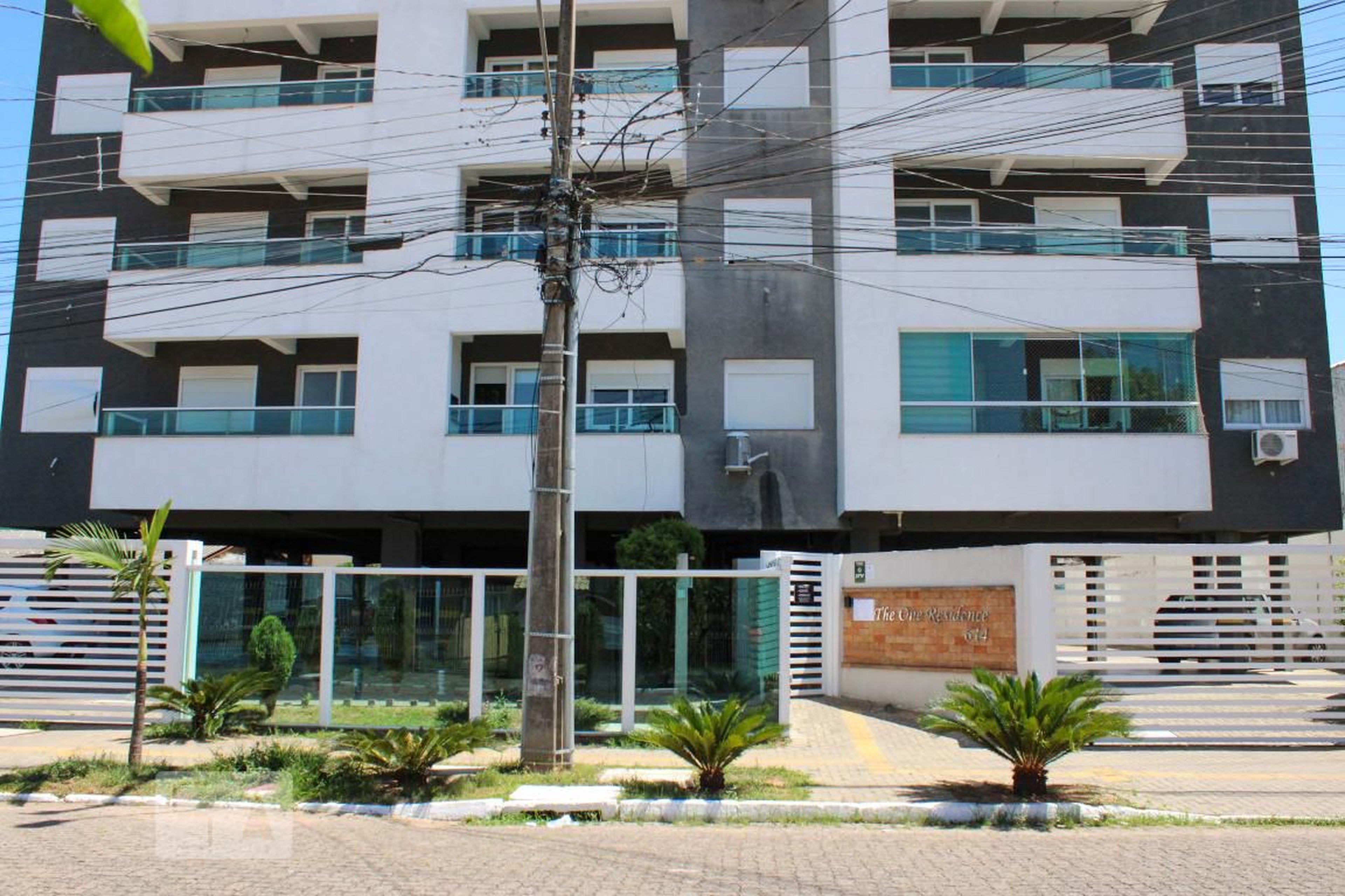 Fachada do Condomínio Condomínio The One Residence