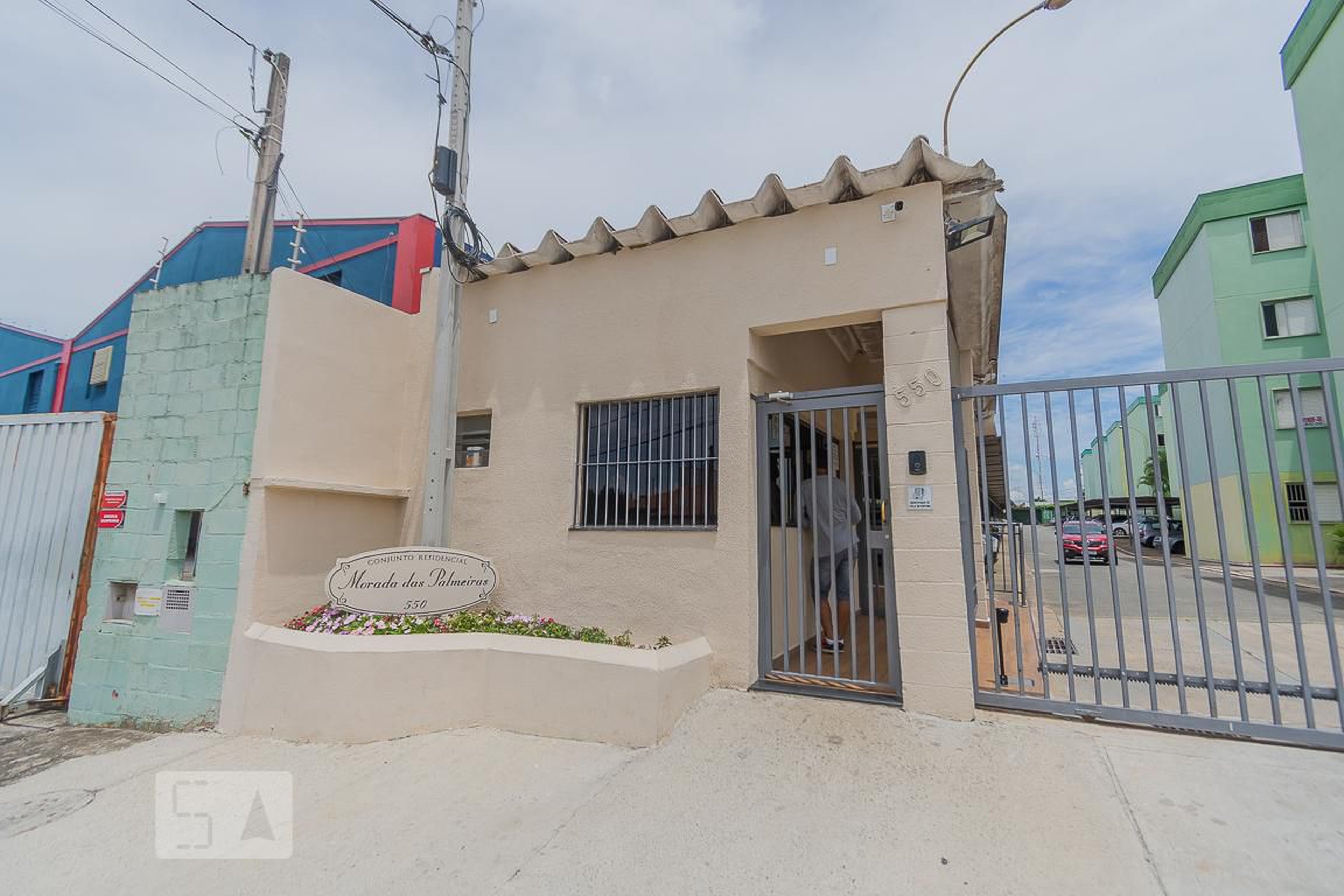 Fachada do Condomínio Condomínio Morada das Palmeiras