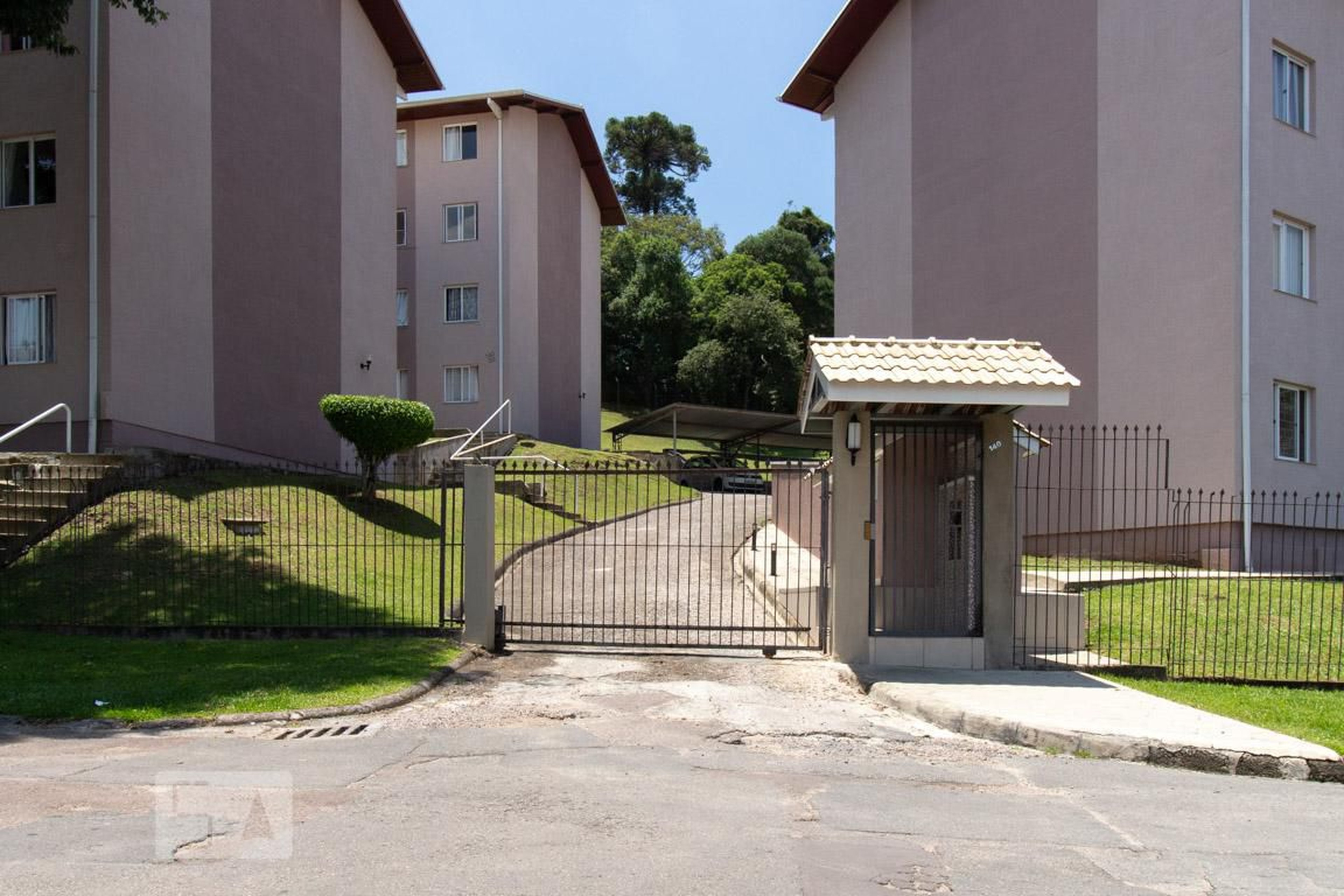 Fachada do Condomínio Condomínio Moradia Araucaria