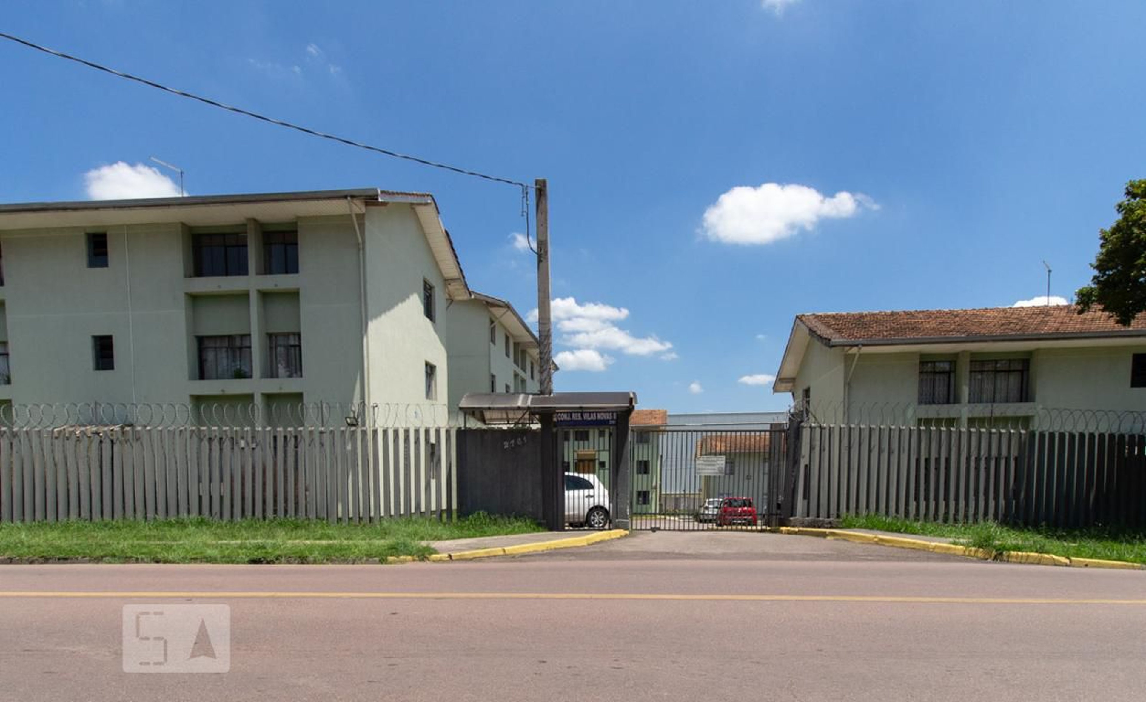 Fachada do Condomínio Condomínio Vila Nova