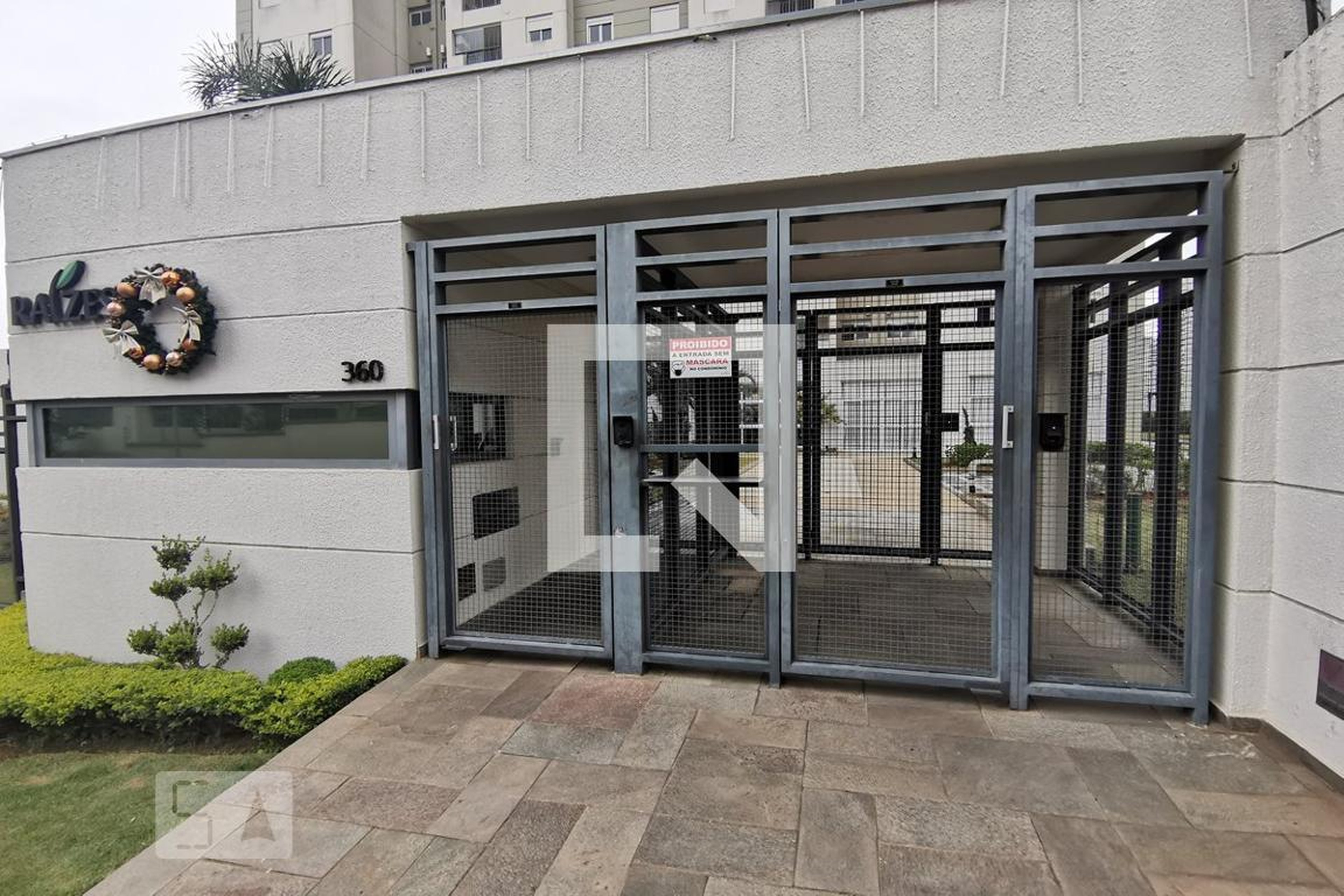 Fachada do Condomínio Condomínio RAIZES do MORUMBI