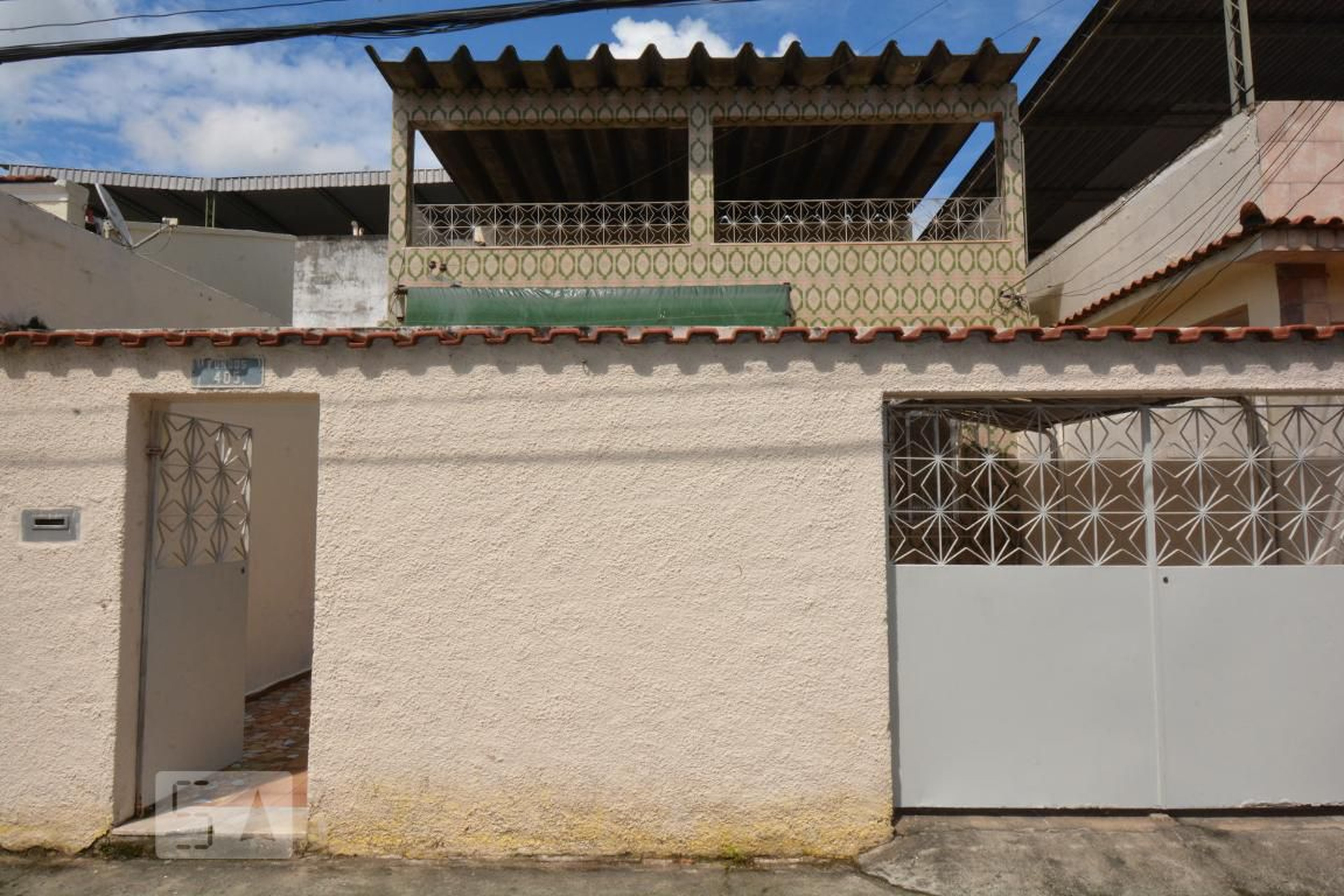 Fachada Condomínio em Rua Guineza, 405