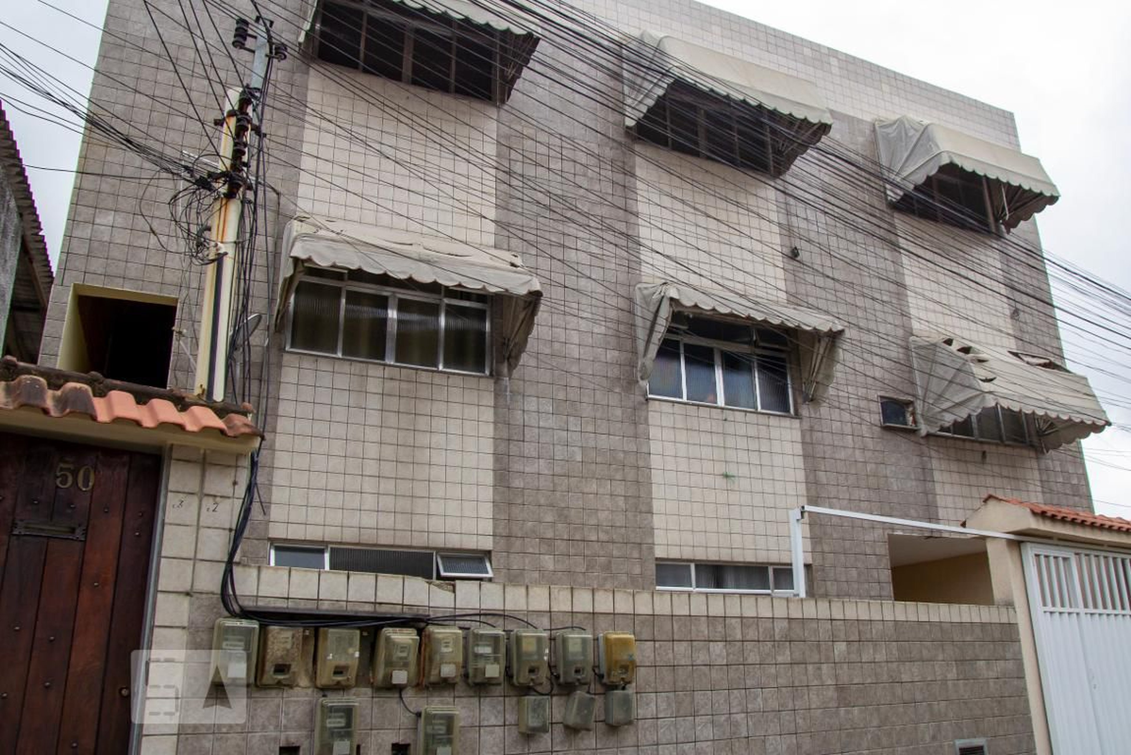 Fachada Condomínio em Rua Américo Pereira, 50