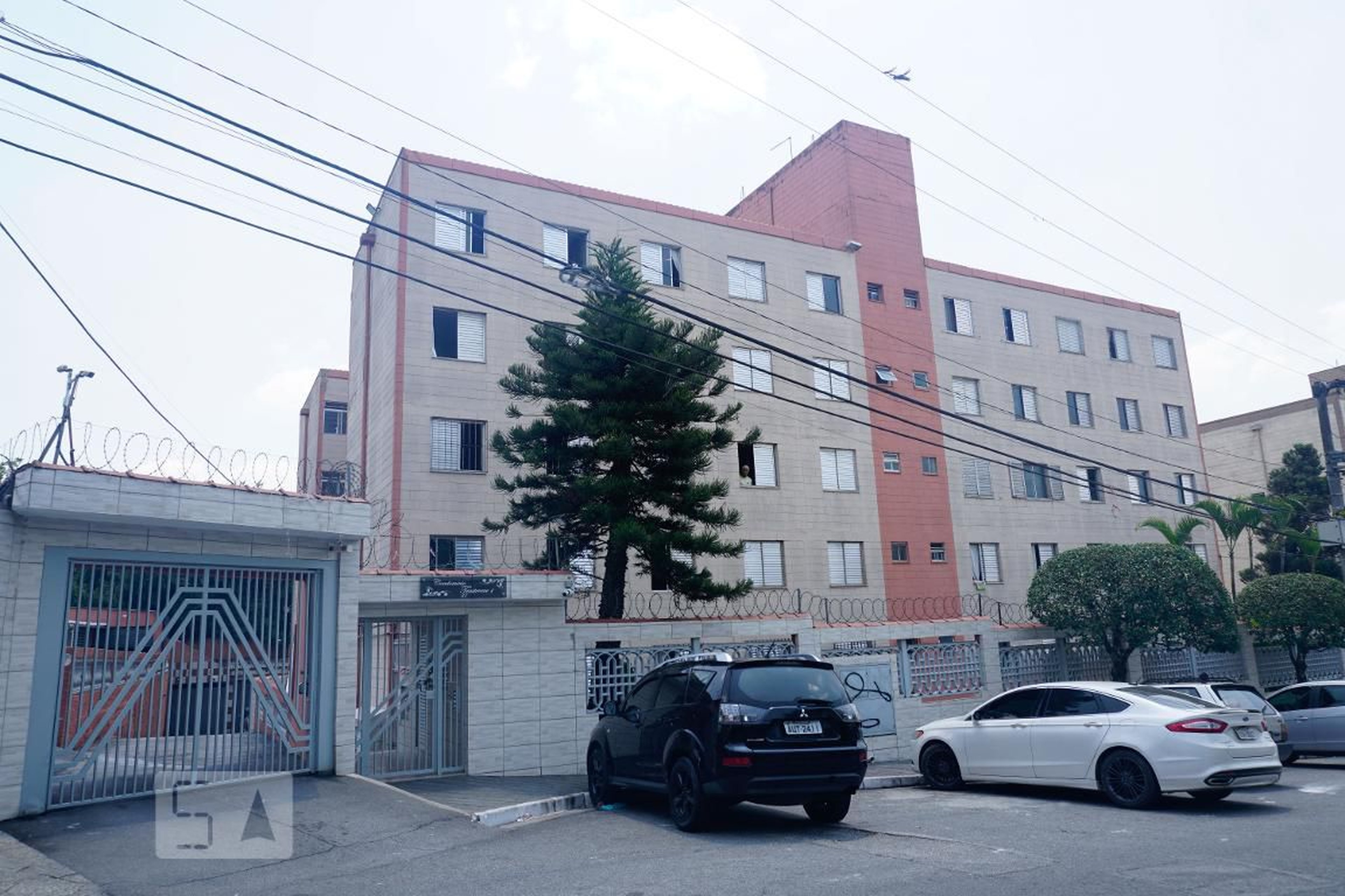 Fachada do Condomínio Condomínio Transtevere