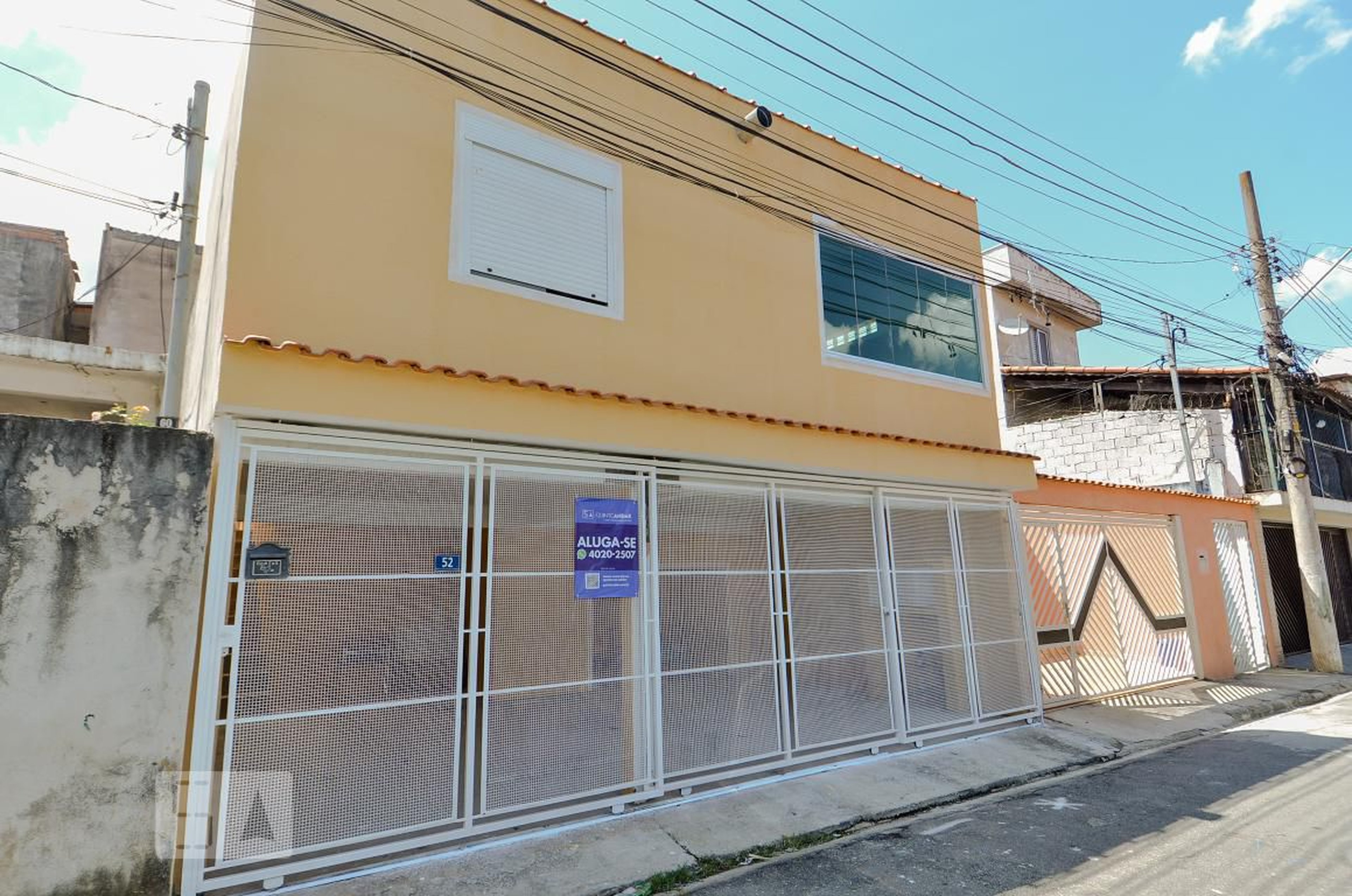 Fachada Condomínio em Rua Lulú Belencas, 52