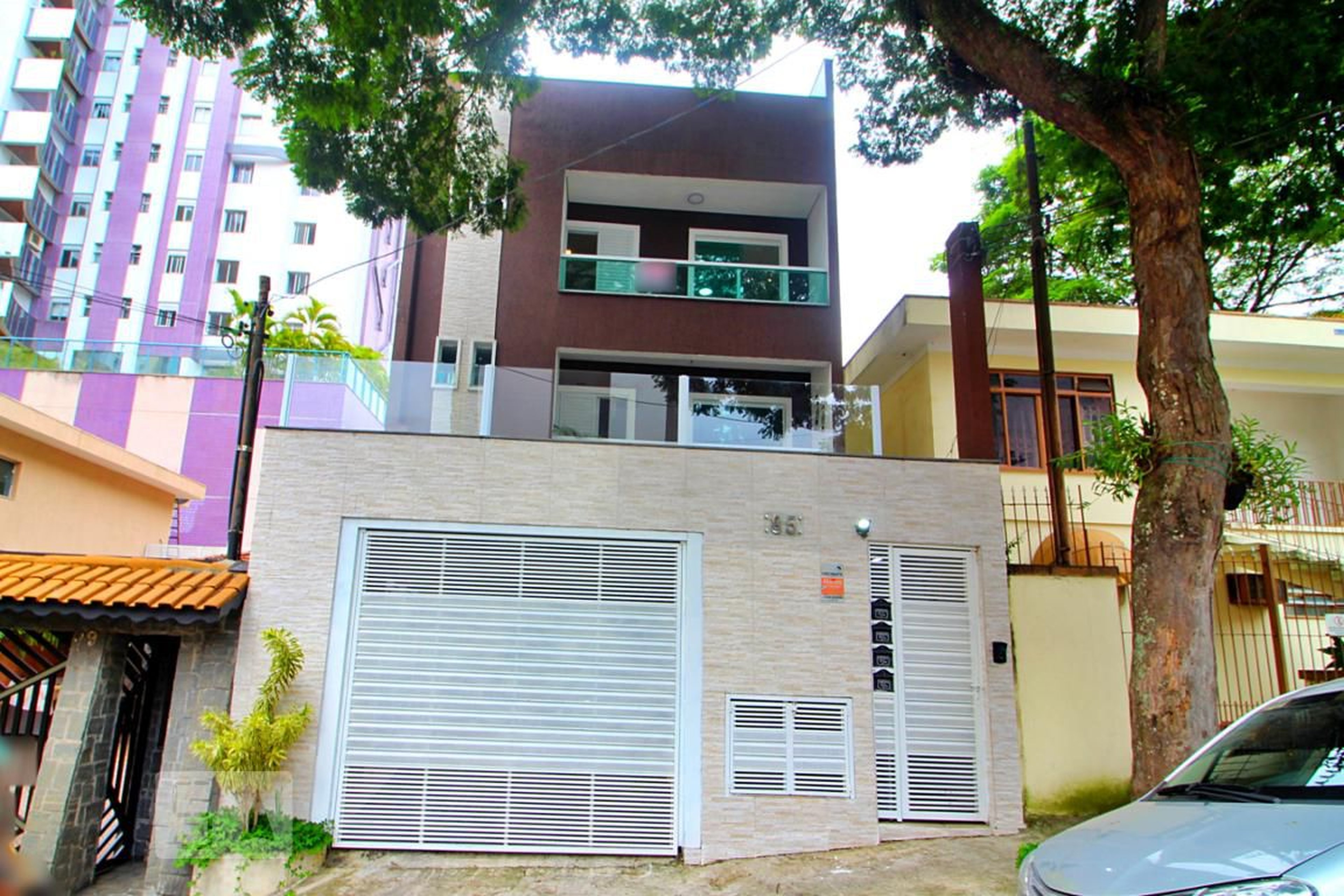 Fachada Condomínio em Rua das Paineiras, 85