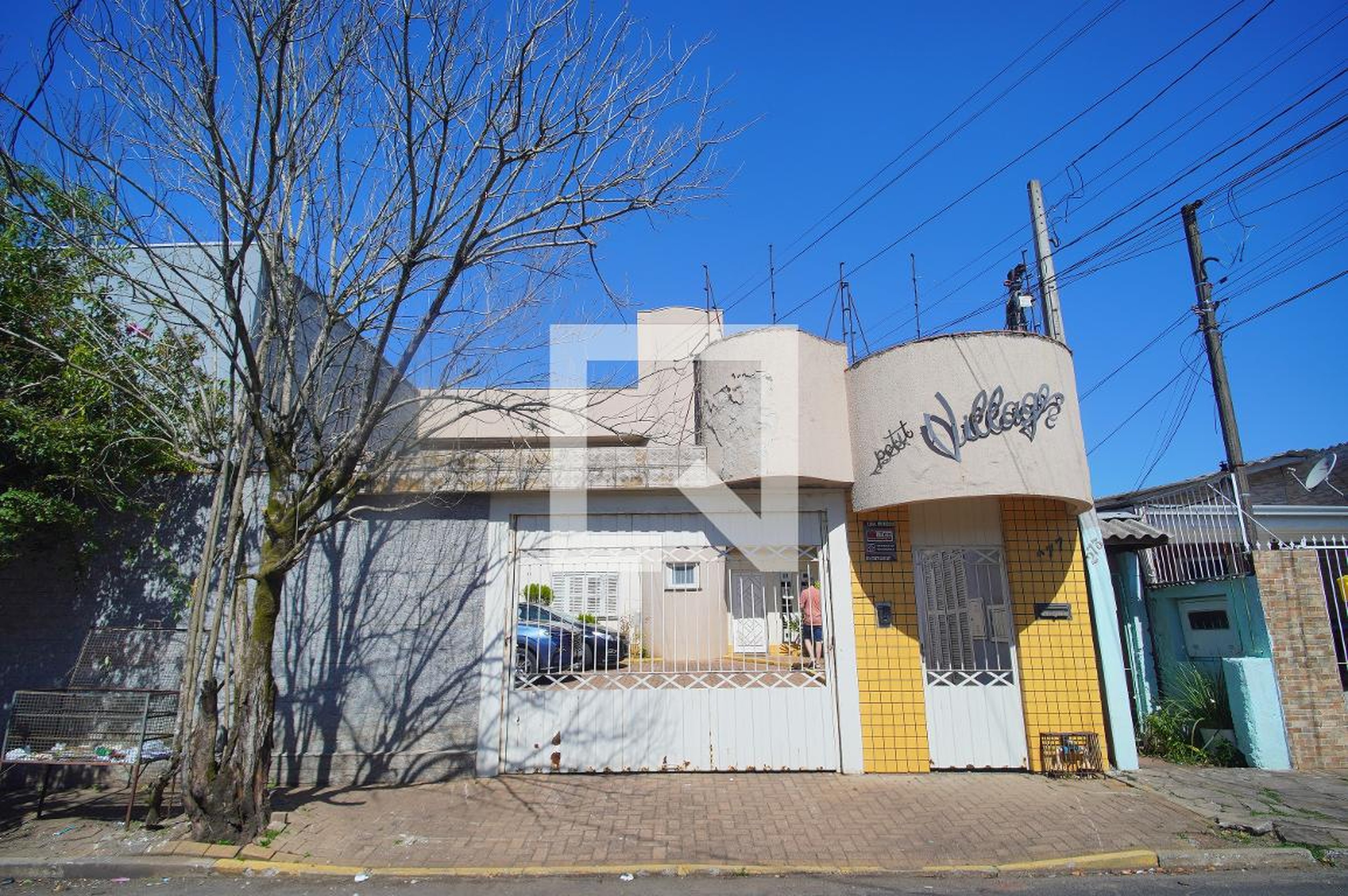 Fachada Condomínio Petit Vilage