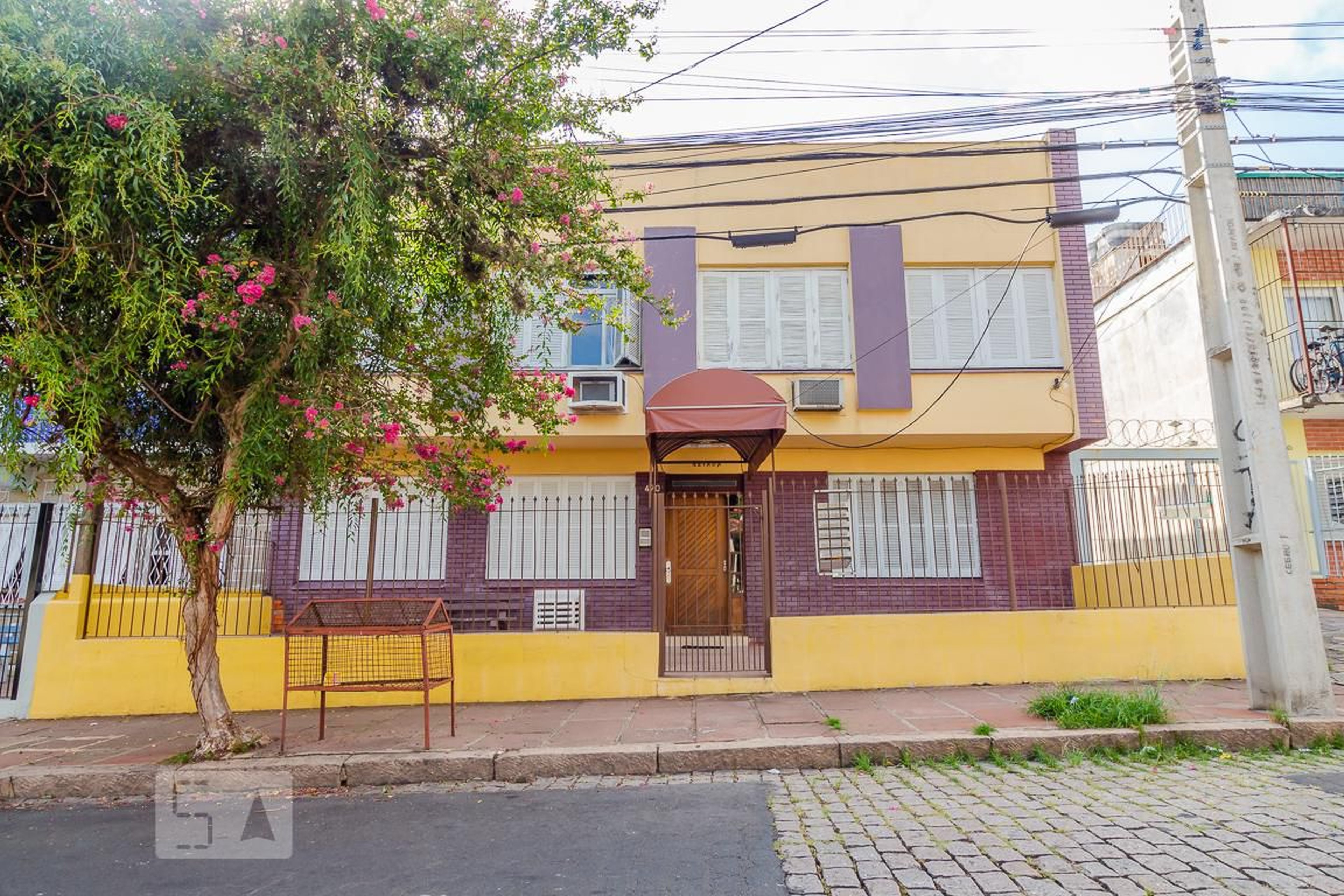 Fachada Condomínio em Rua Doutor Voltaire Pires, 470