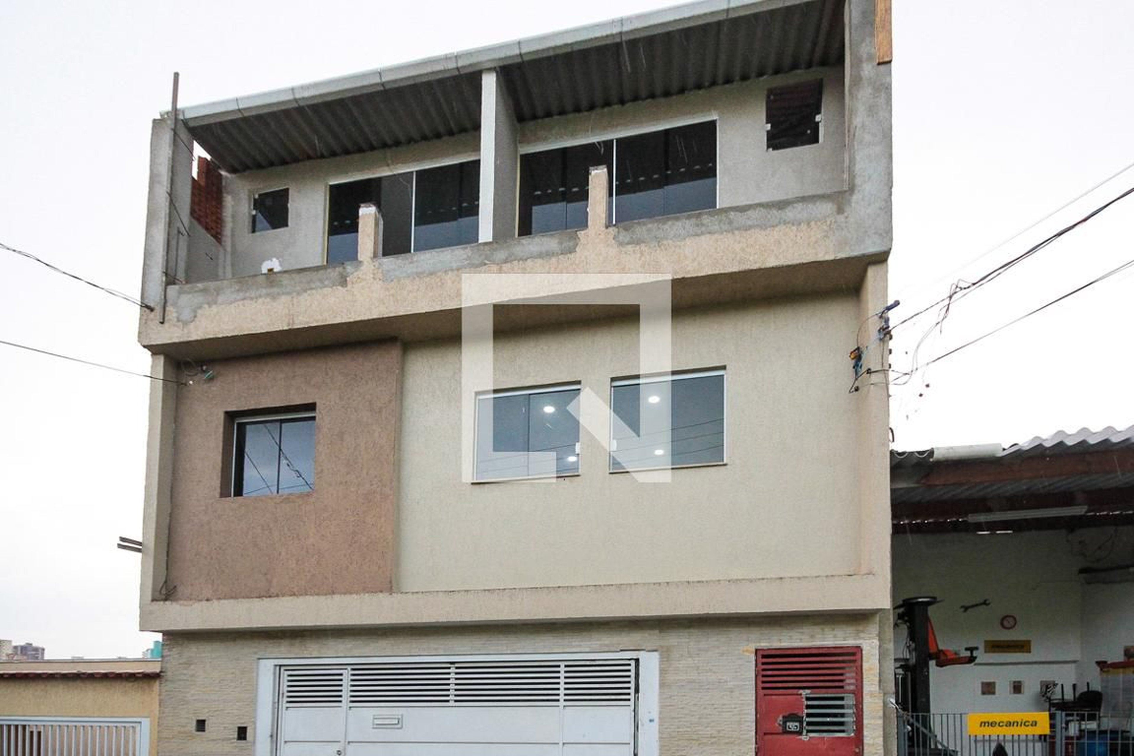 Fachada Condomínio em Rua Ernesto Giuliano, 138