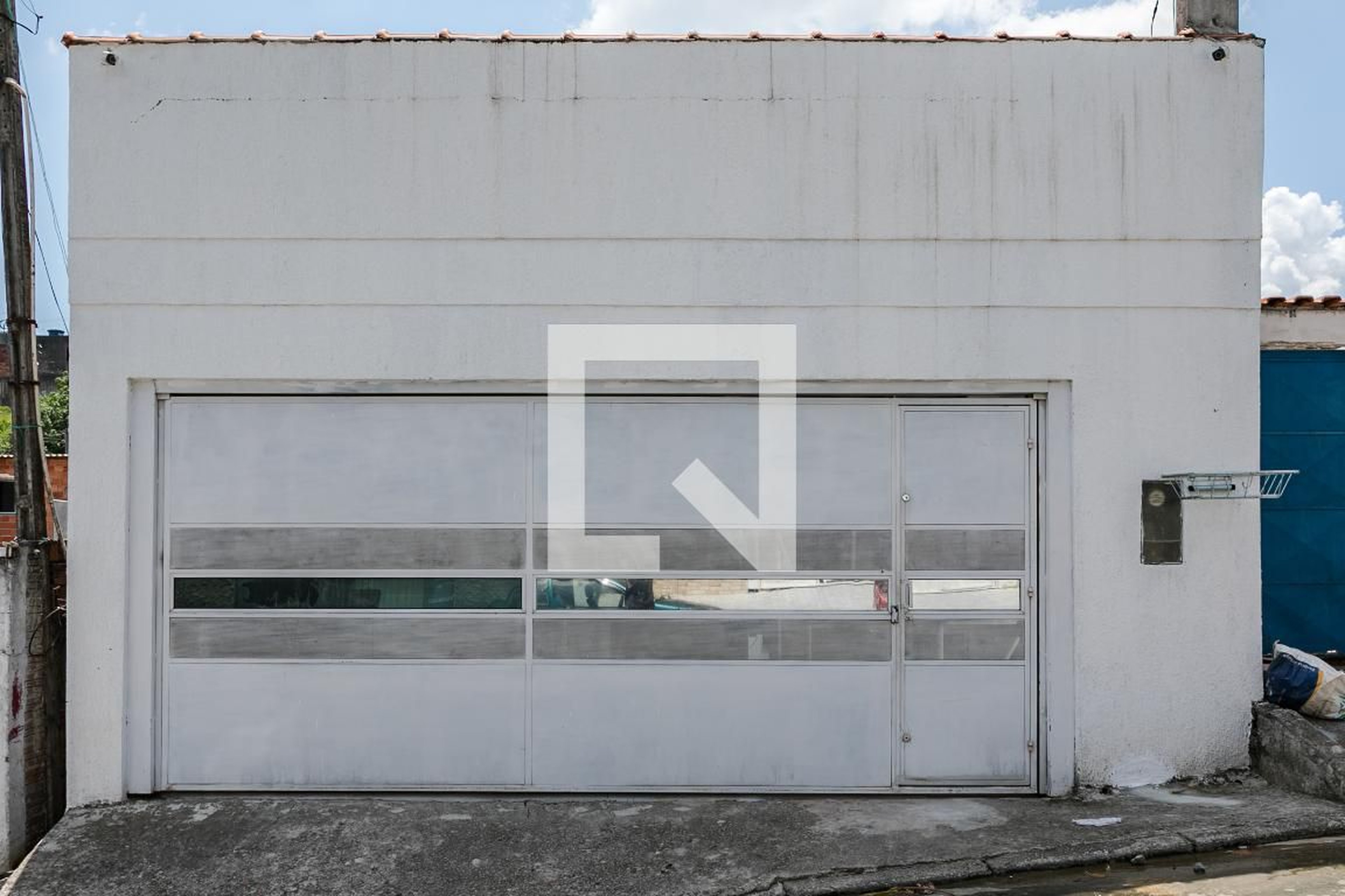 Fachada Condomínio em Rua Cumbica, 90