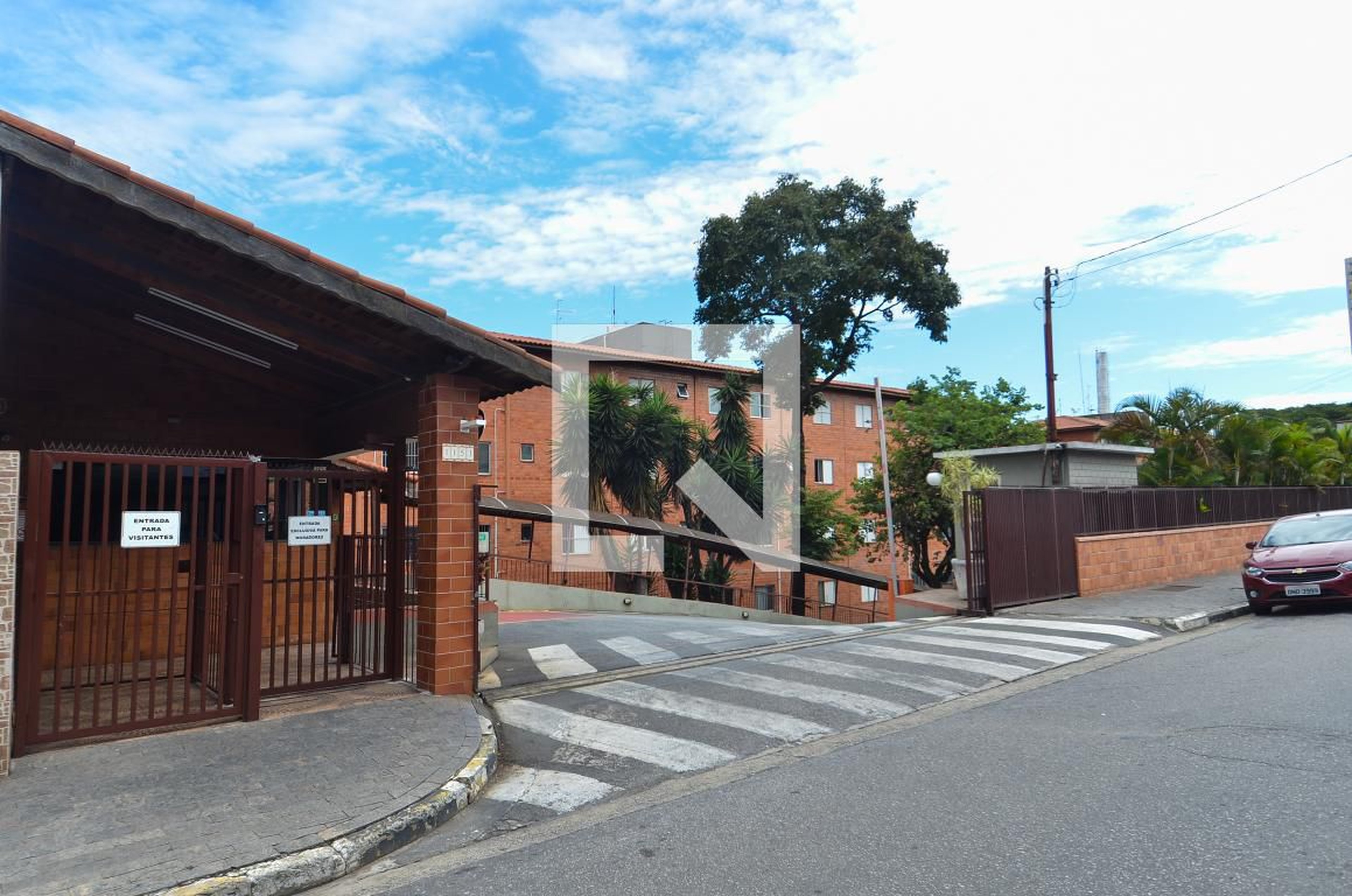 Fachada do Condomínio Condomínio Itália