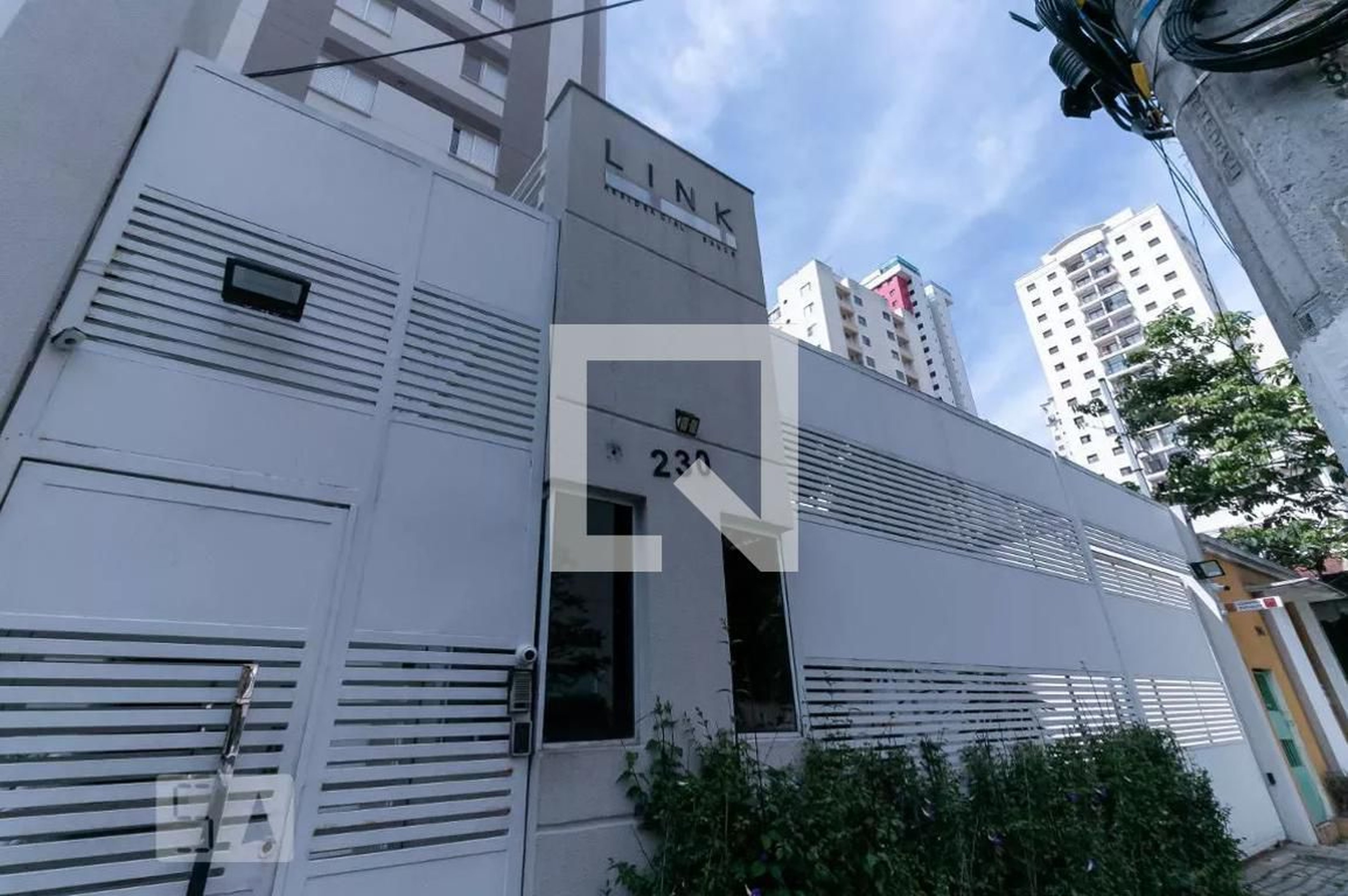Fachada Condomínio em Rua Gomes de Carvalho, 230