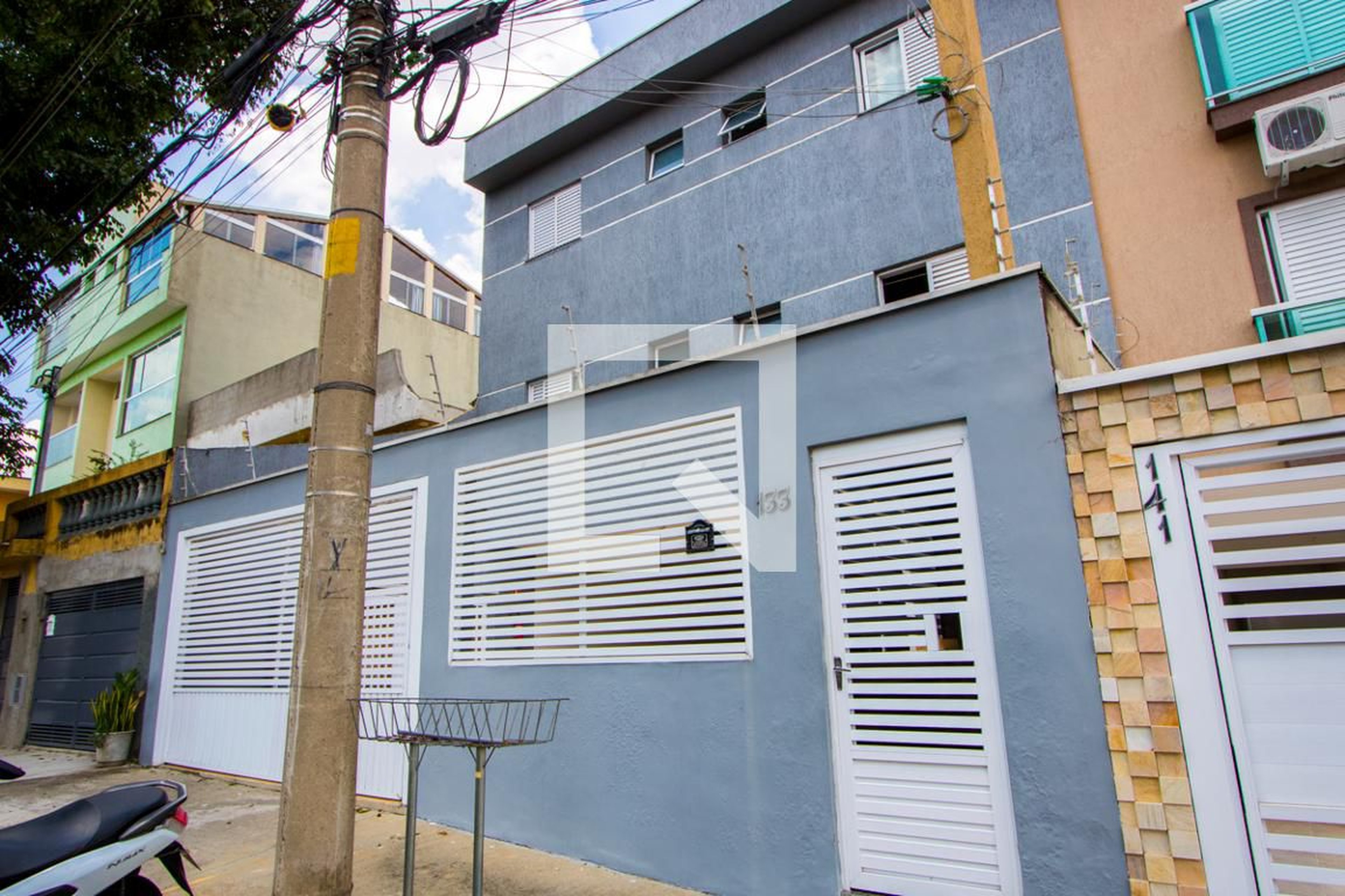 Fachada Condomínio em Rua Amarílis, 133
