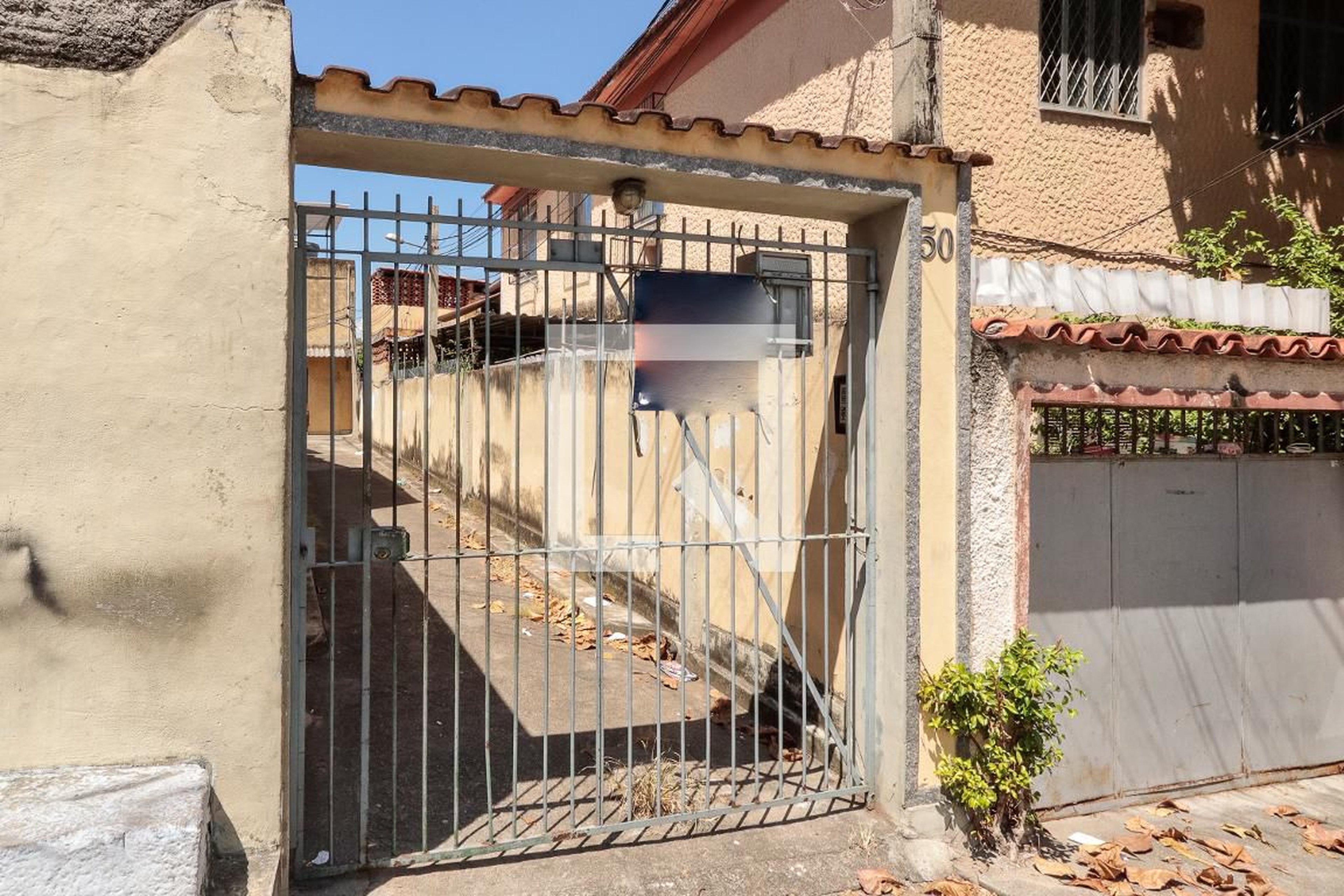 Entrada Condomínio em Rua Américo Vespúcio, 50