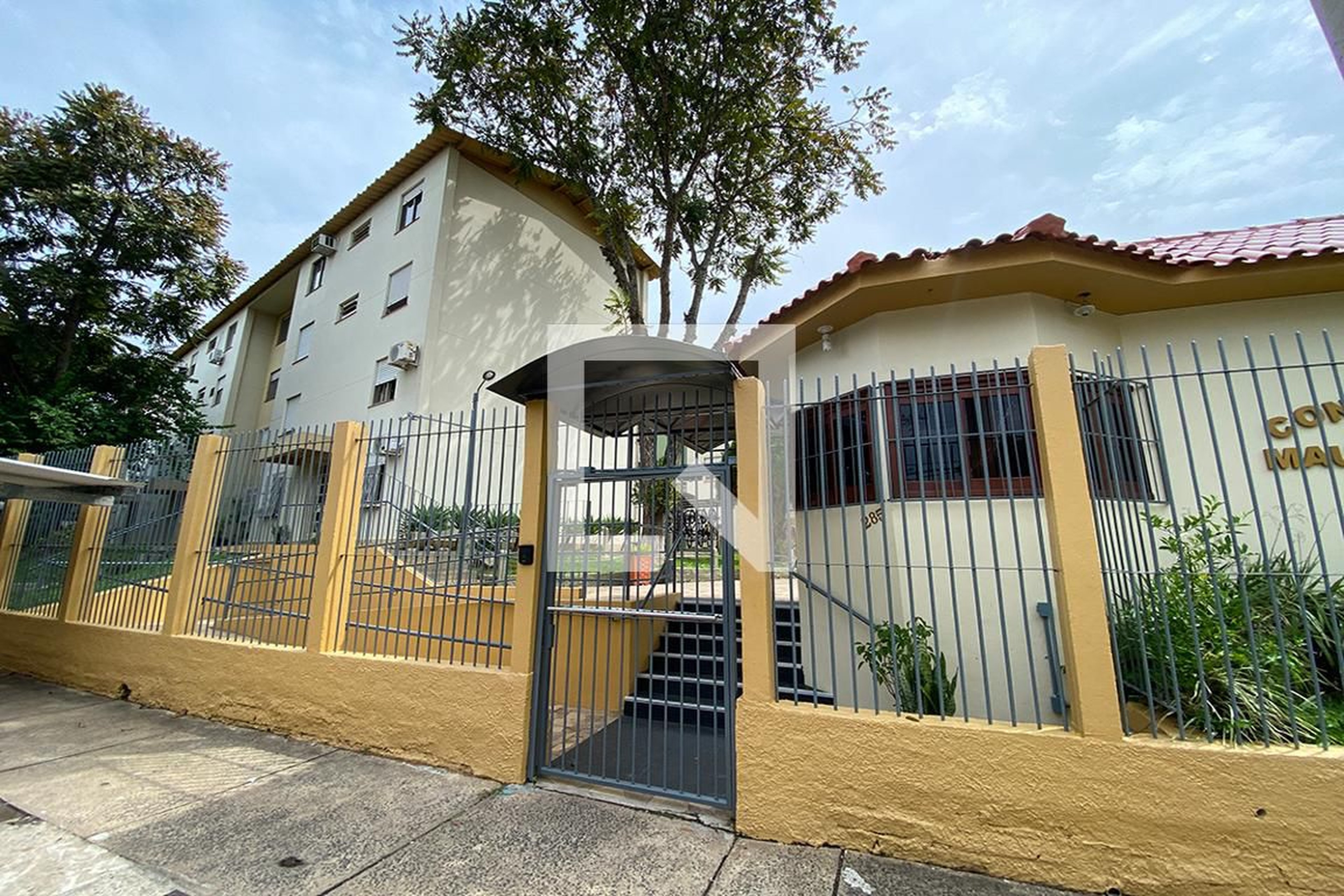 Fachada do Condomínio Condomínio Mauro Chika