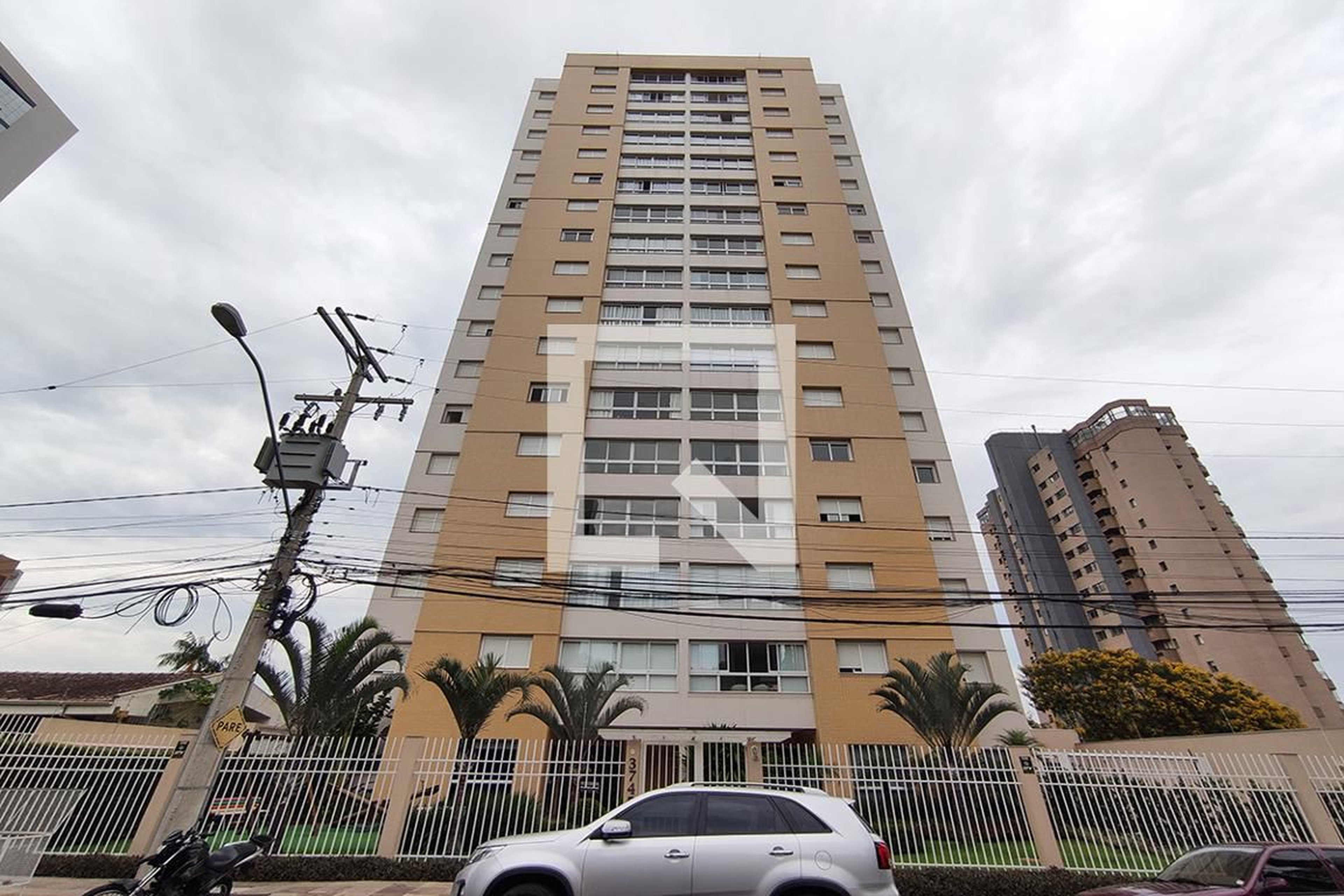 Fachada do Condomínio Condomínio Cosmopolitan Residence