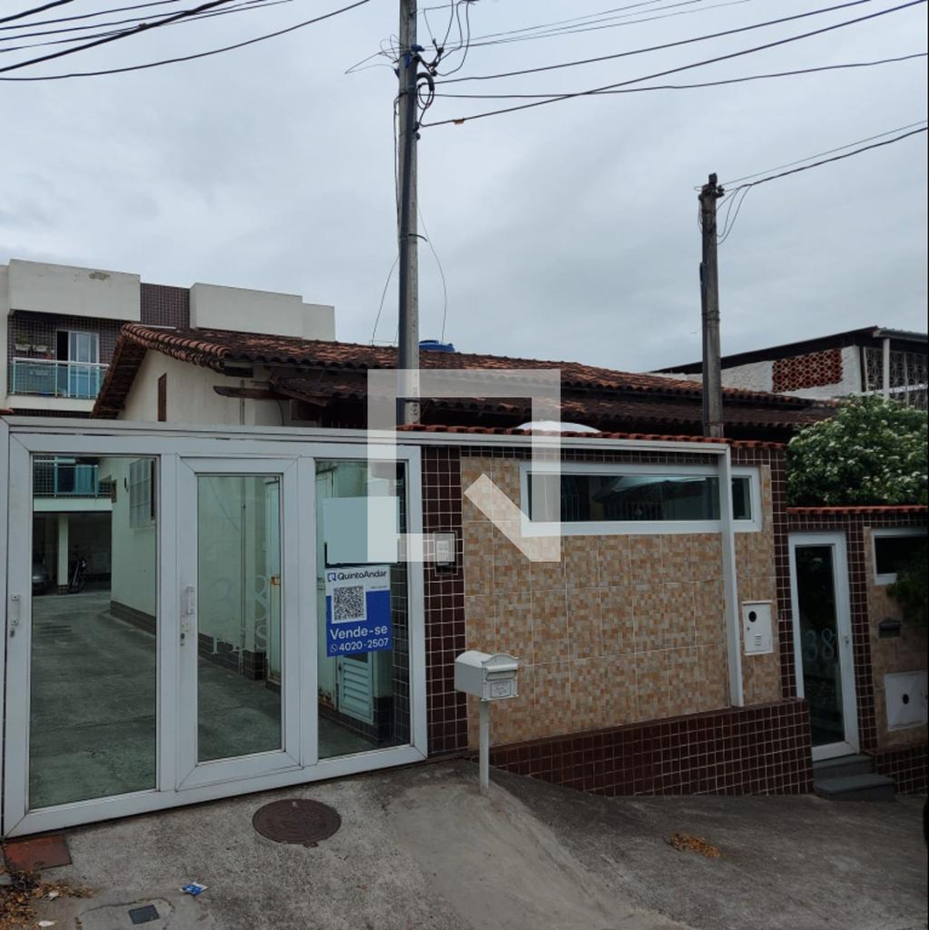 Fachada do Condomínio Condomínio Alto Guarani