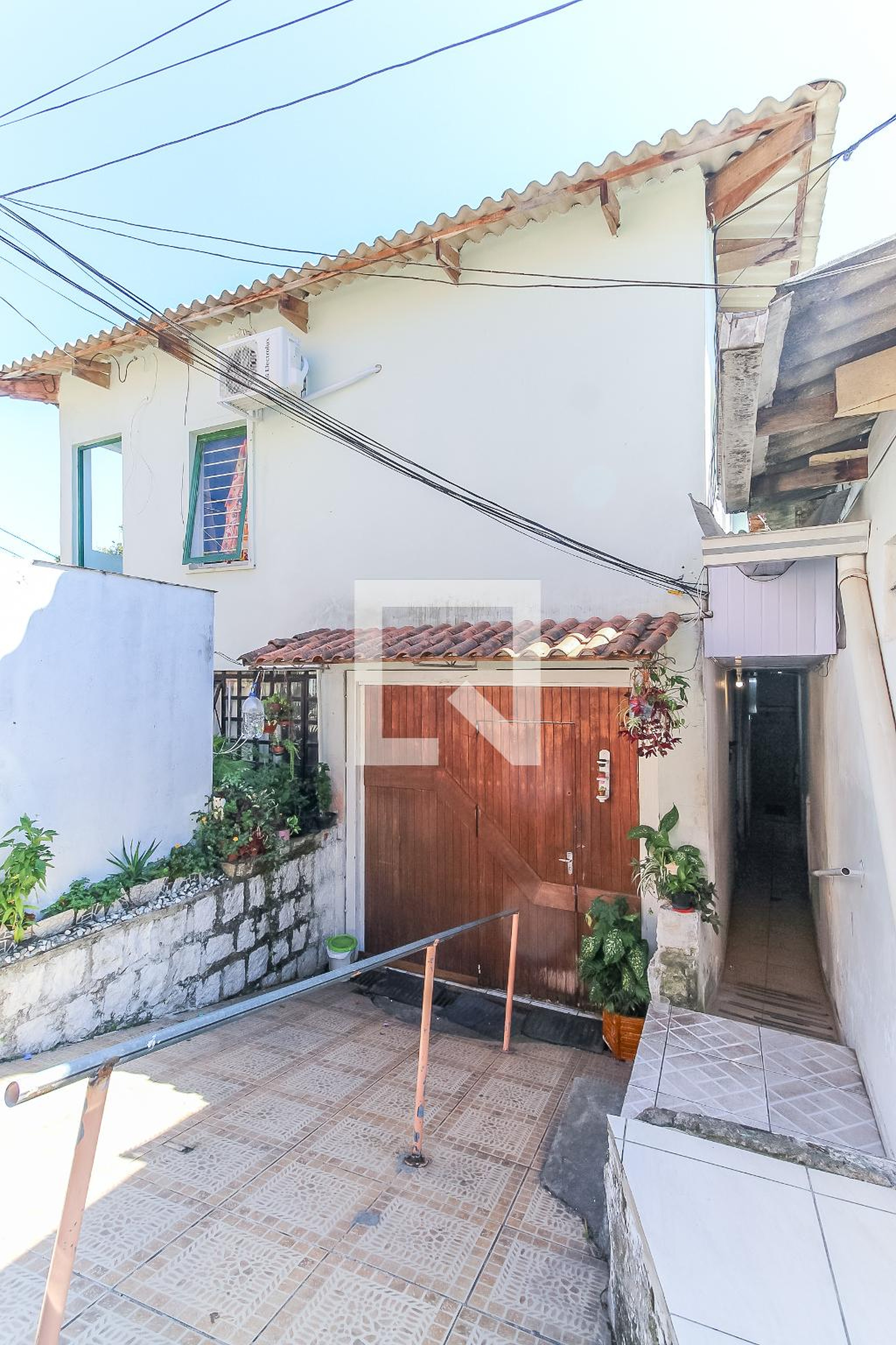 Fachada Condomínio em Rua Bororó, 4