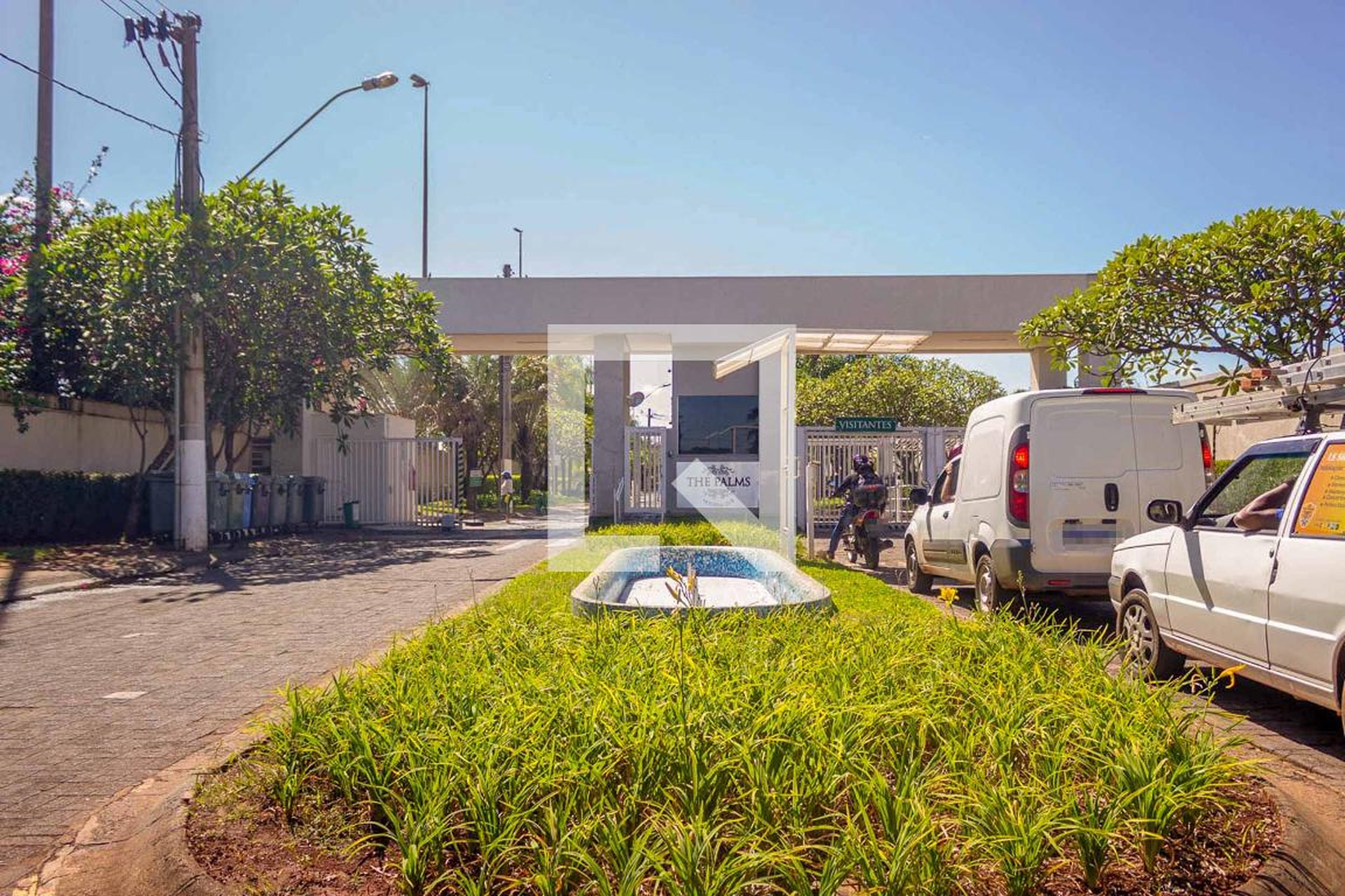 Fachada do Condomínio Condomínio The Palms