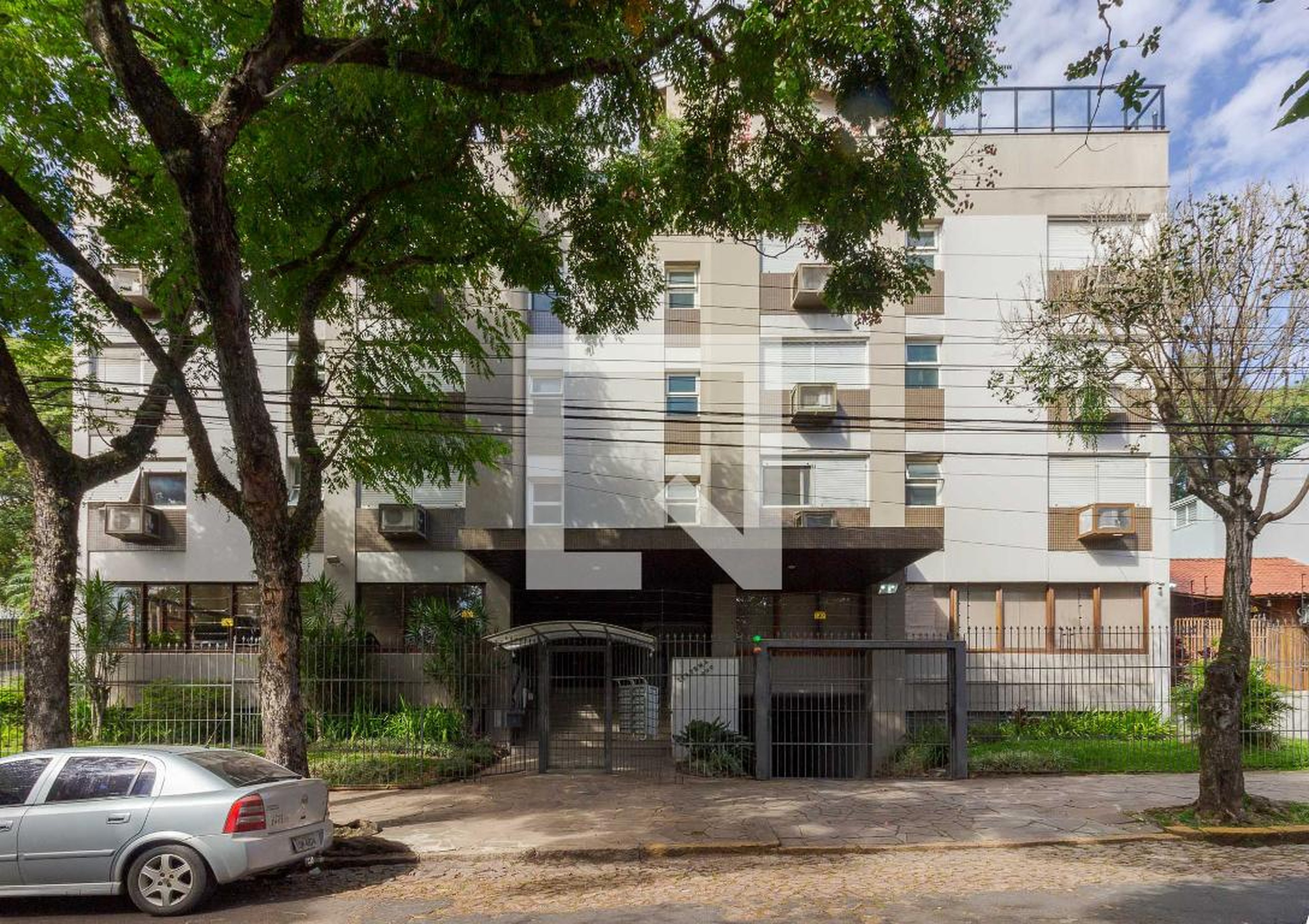 Fachada Condomínio em Rua Tenente Coronel Fabricio Pillar, 999