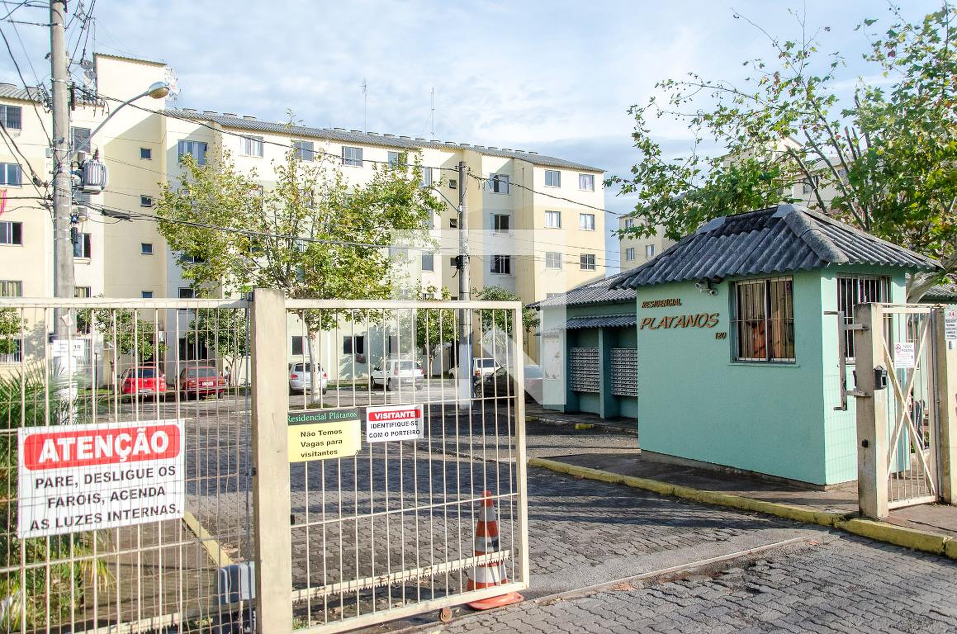 Fachada Condomínio em Rua Alameda das Corticeiras, 518