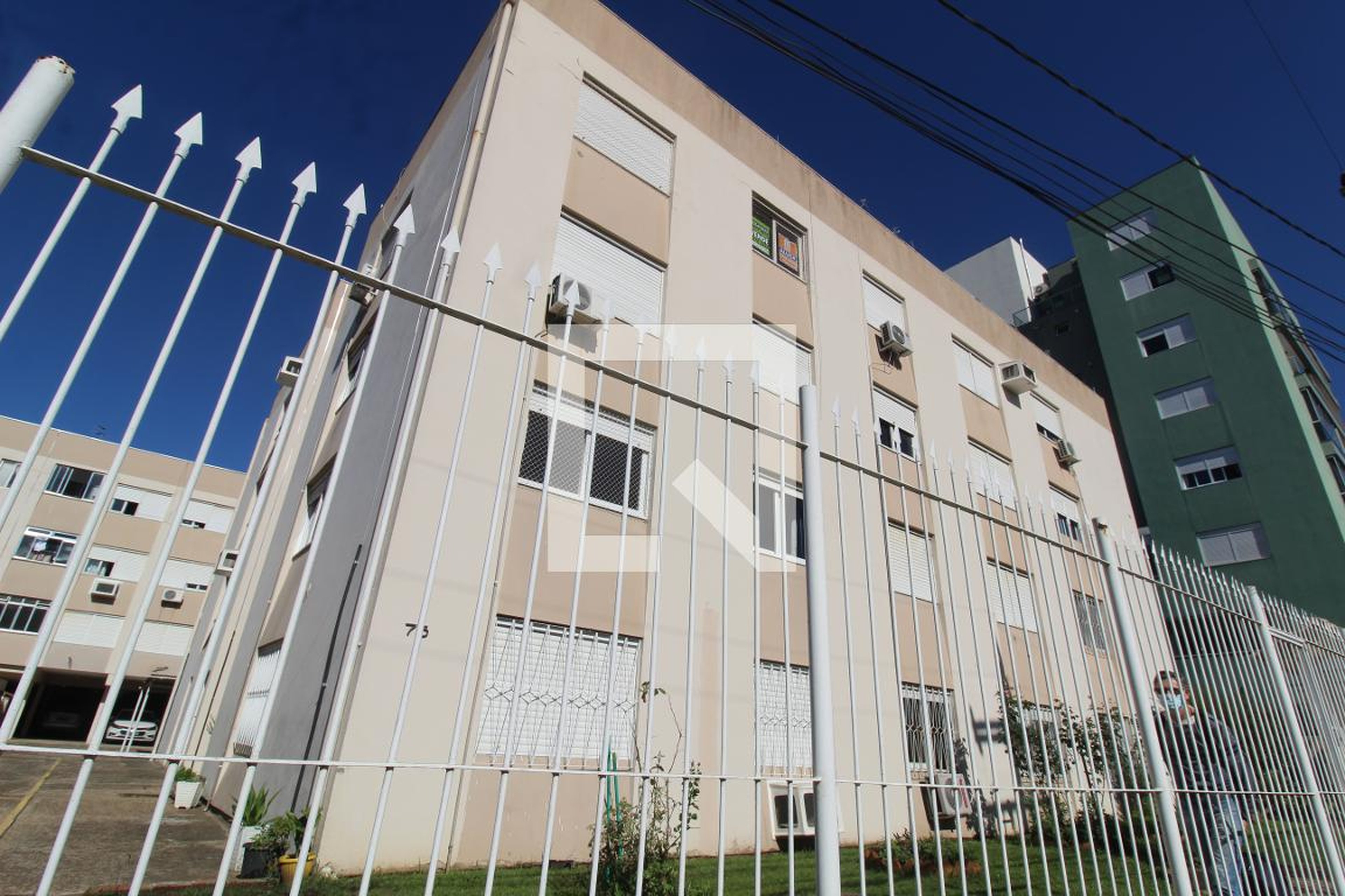 Fachada Condomínio em Rua Doutor Miguel Viêira Ferreira, 75