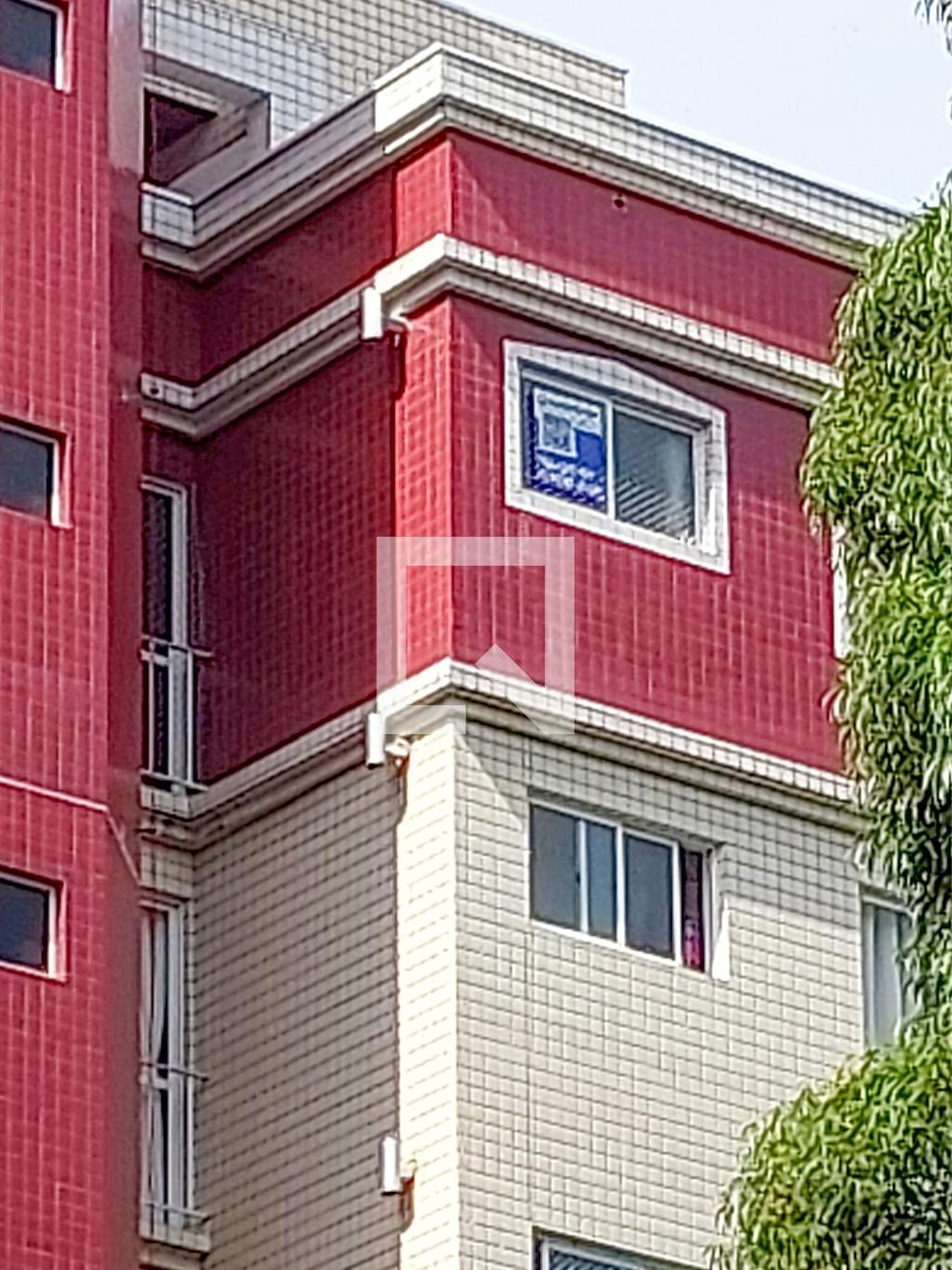 Fachada Condomínio em Rua Silveira Peixoto, 497