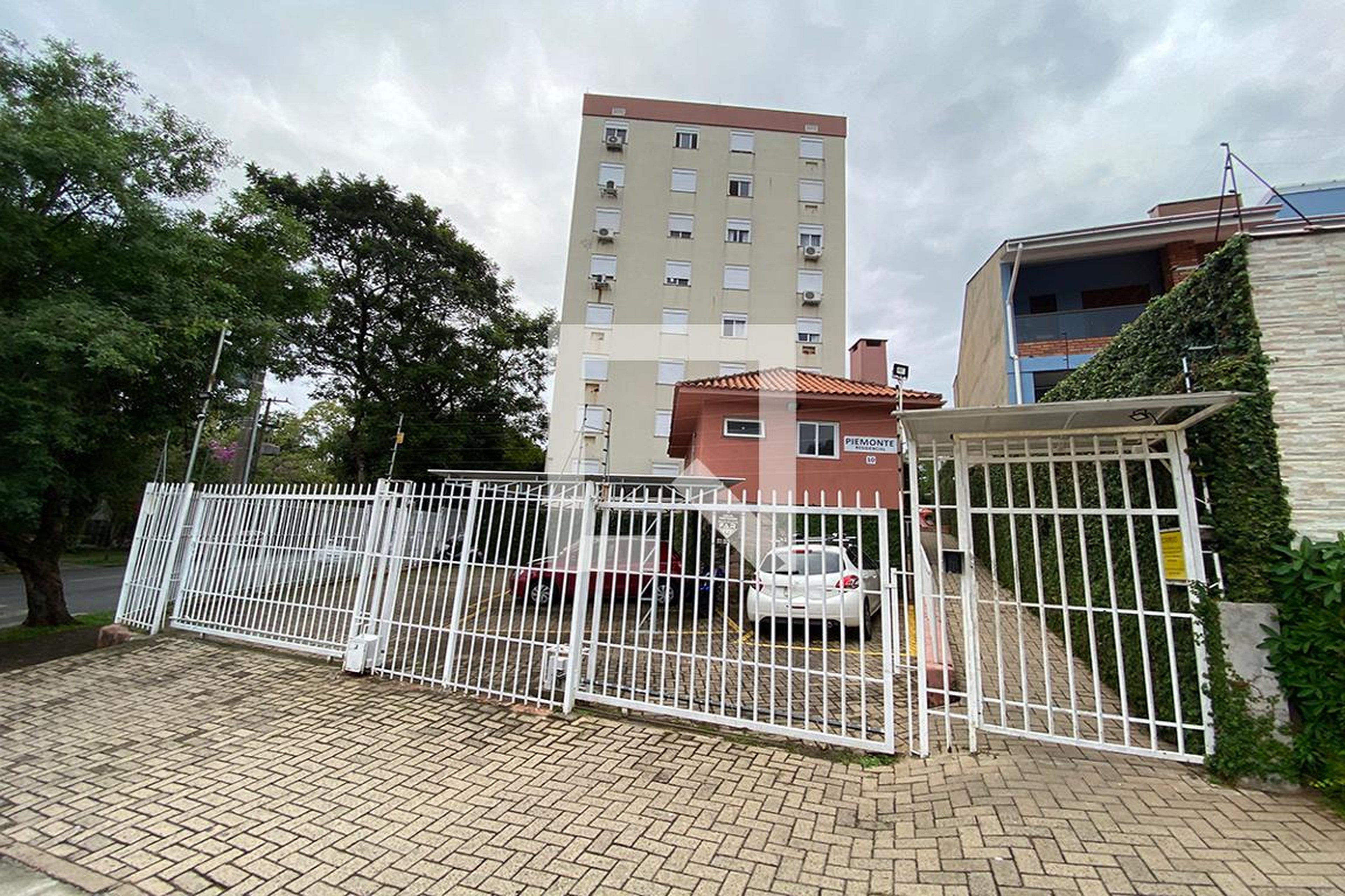 Fachada do Condomínio Condomínio Piemonte