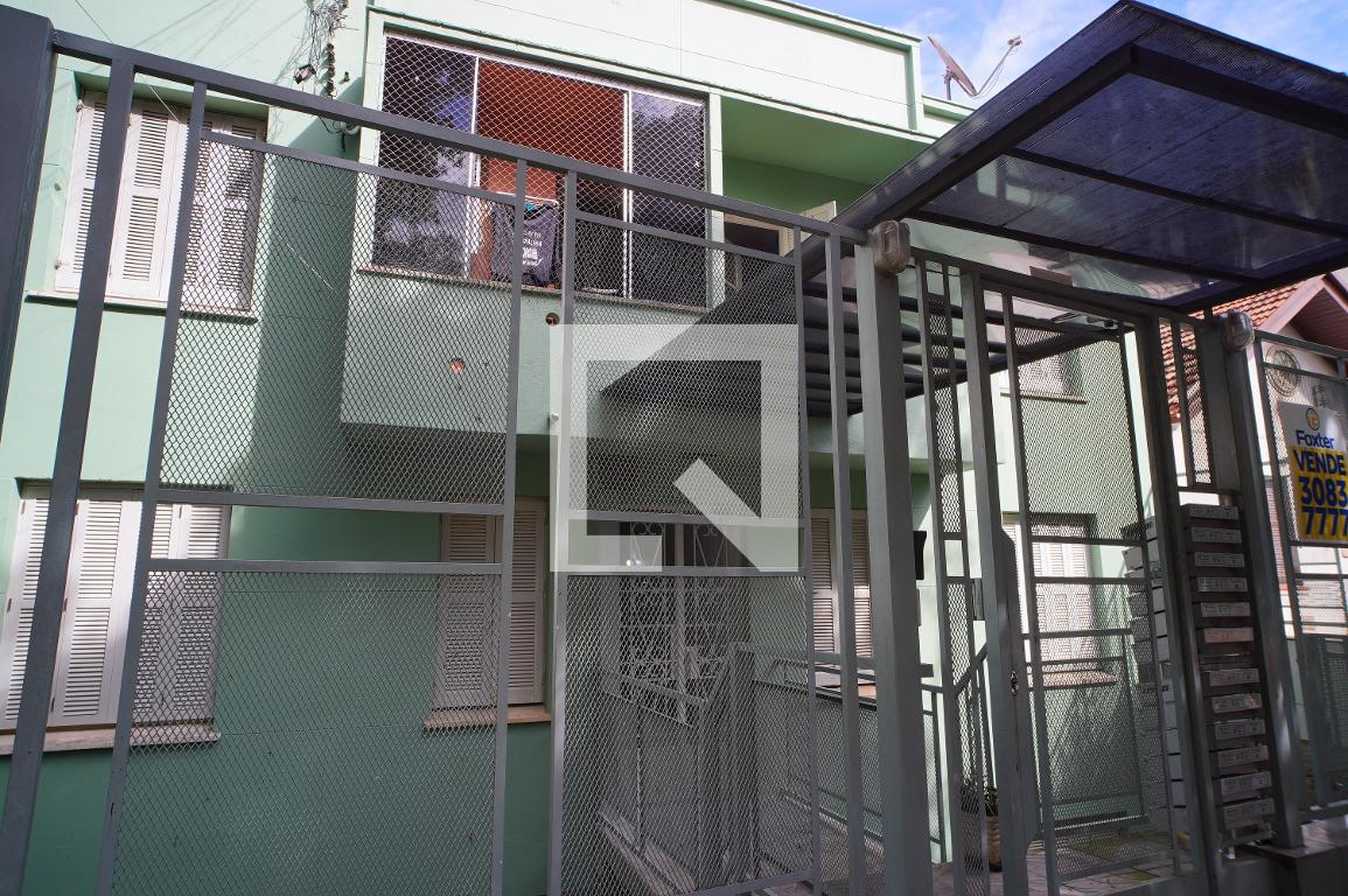 Fachada do Condomínio Condomínio em Rua Mariz e Barros, 211