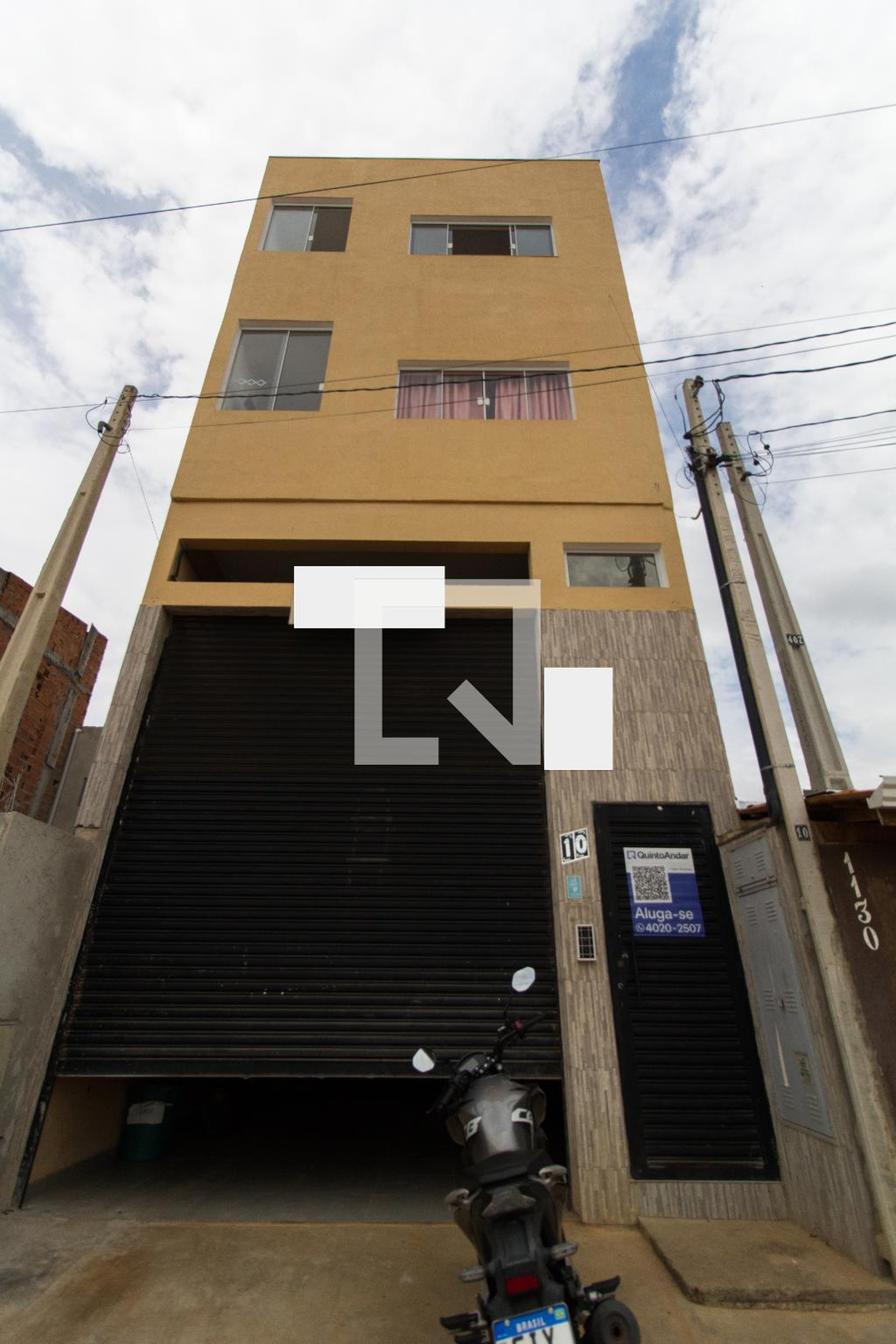 Fachada Condomínio em Rua Fausto Rodrigues de Oliveira, 1162