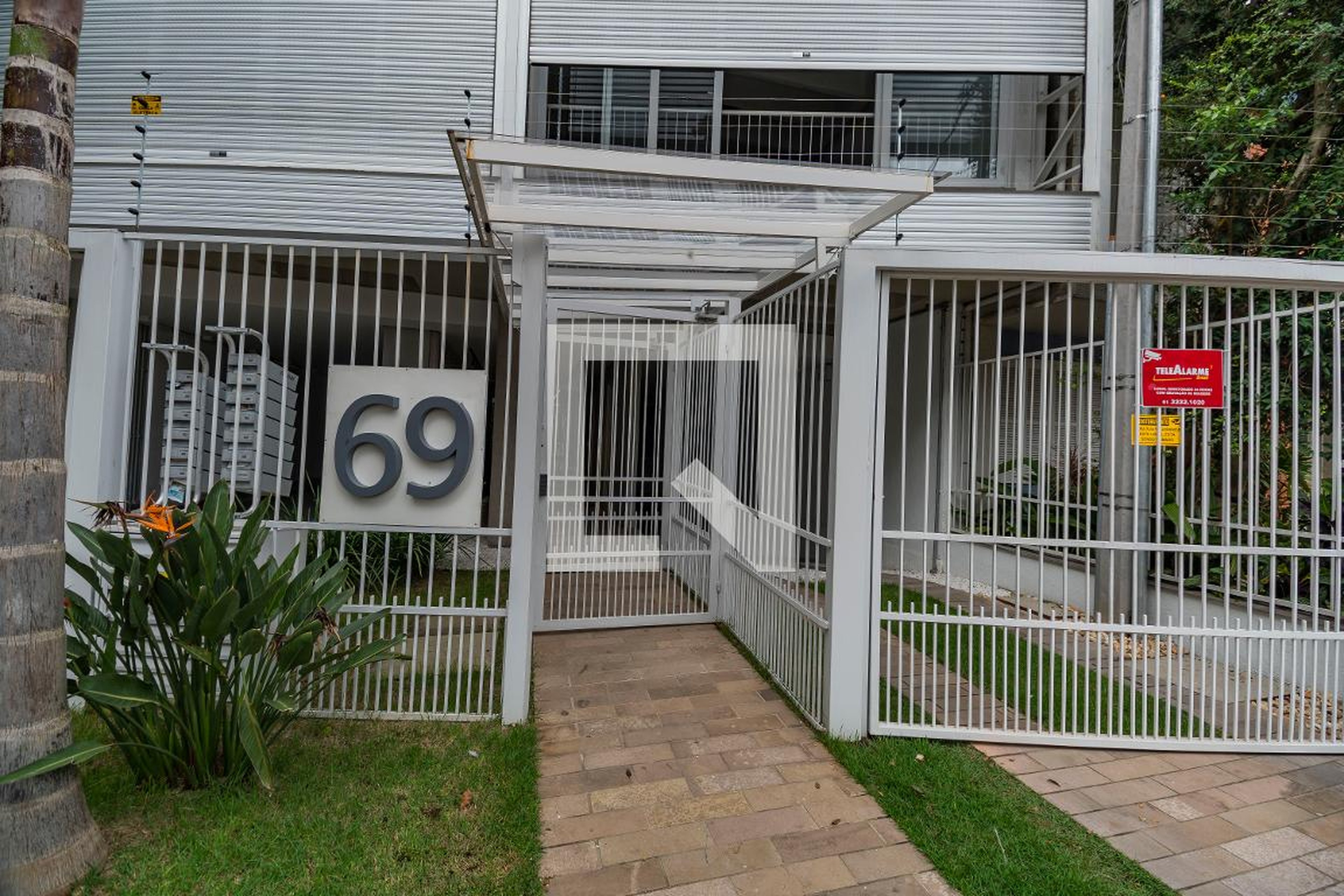 Fachada do Condomínio Edifício Santos Neto 67