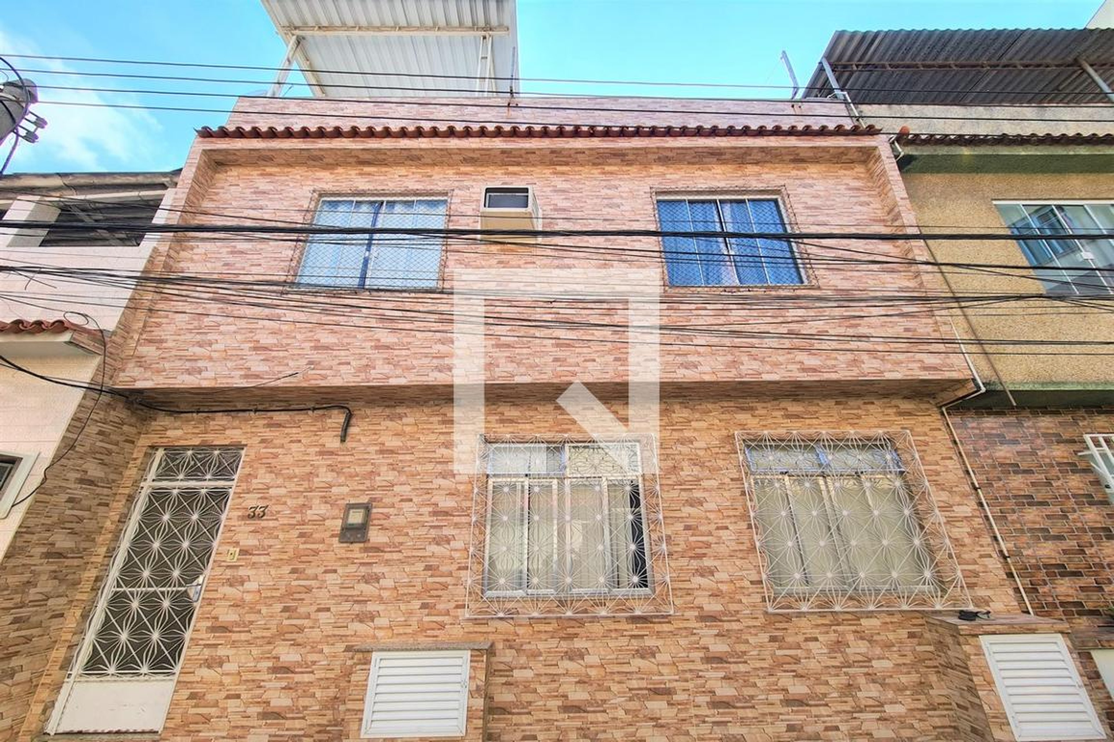 Fachada Condomínio em Rua Miguel Cervantes, 144