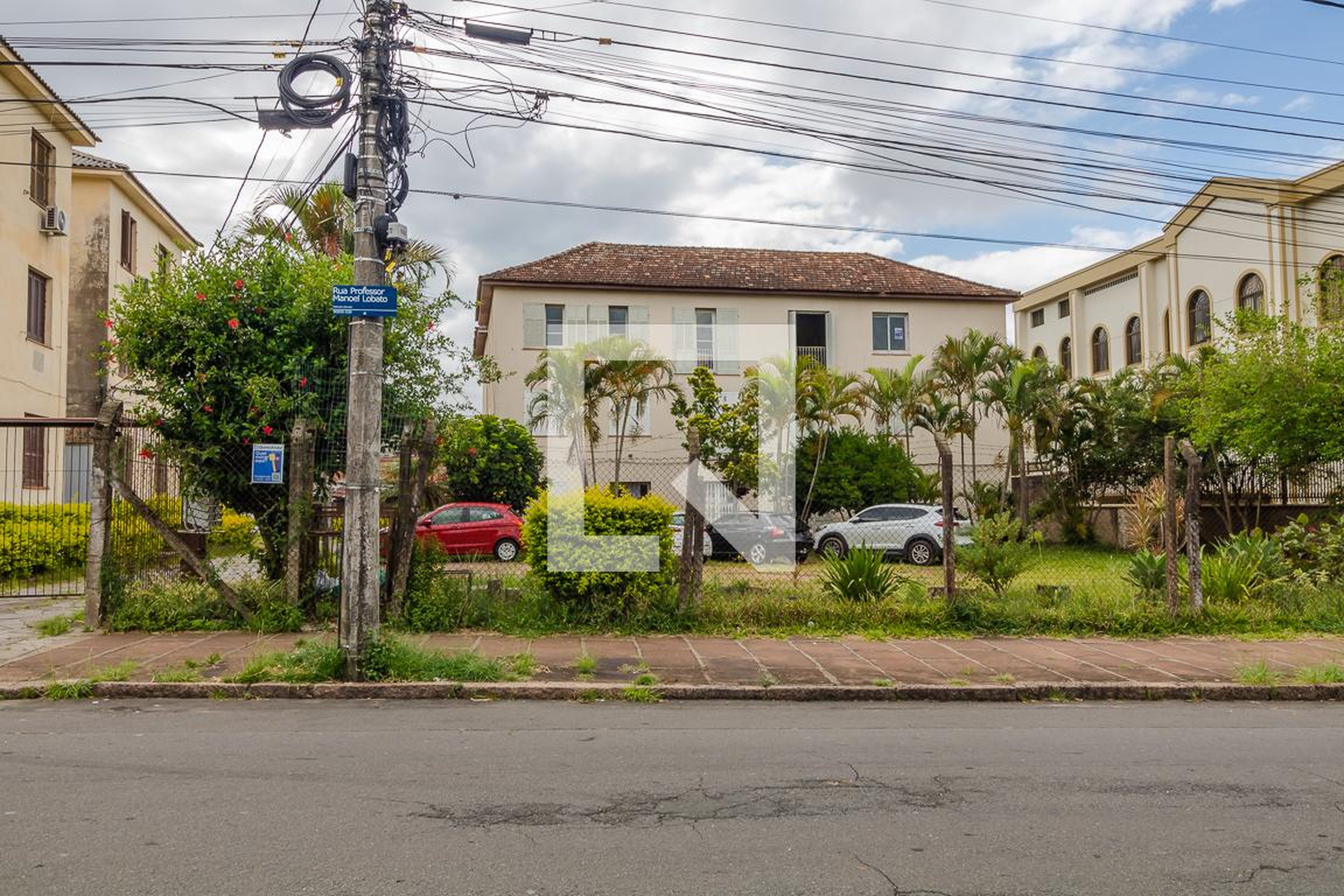 Fachada Condomínio em Rua Professor Manoel Lobato, 547