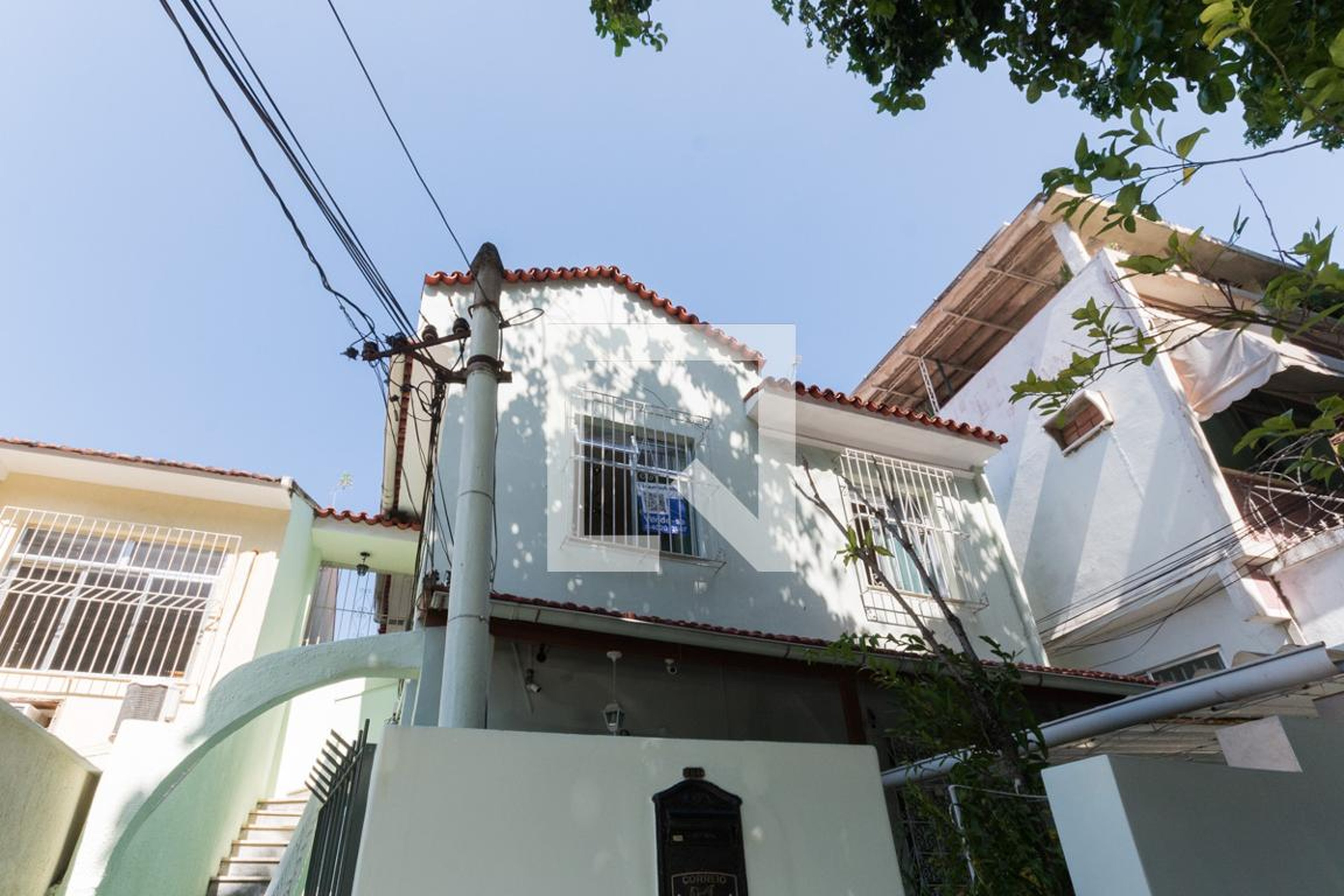 Fachada Condomínio em Rua Indaiacu, 19