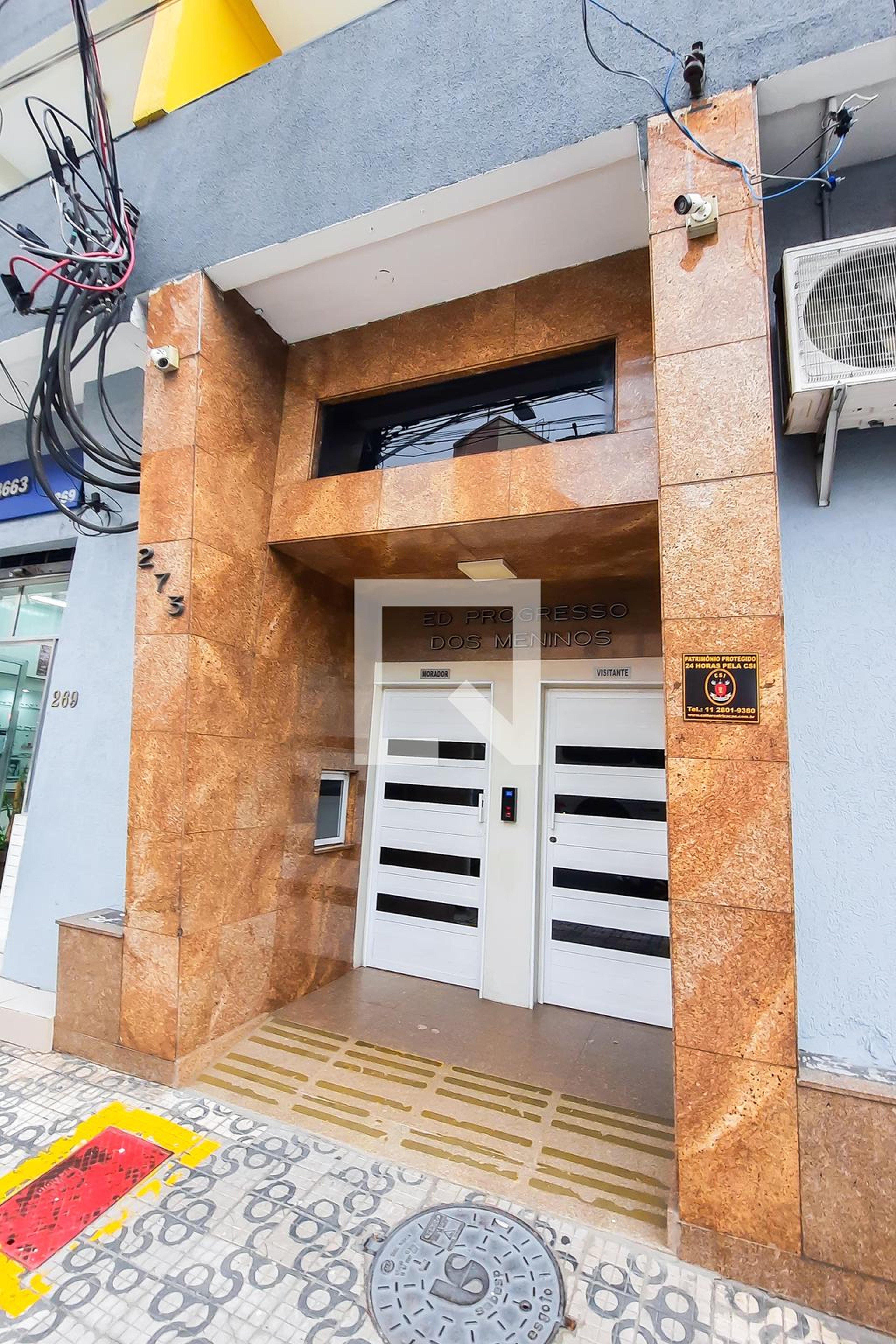 Fachada do Condomínio Condomínio Progresso dos Meninos